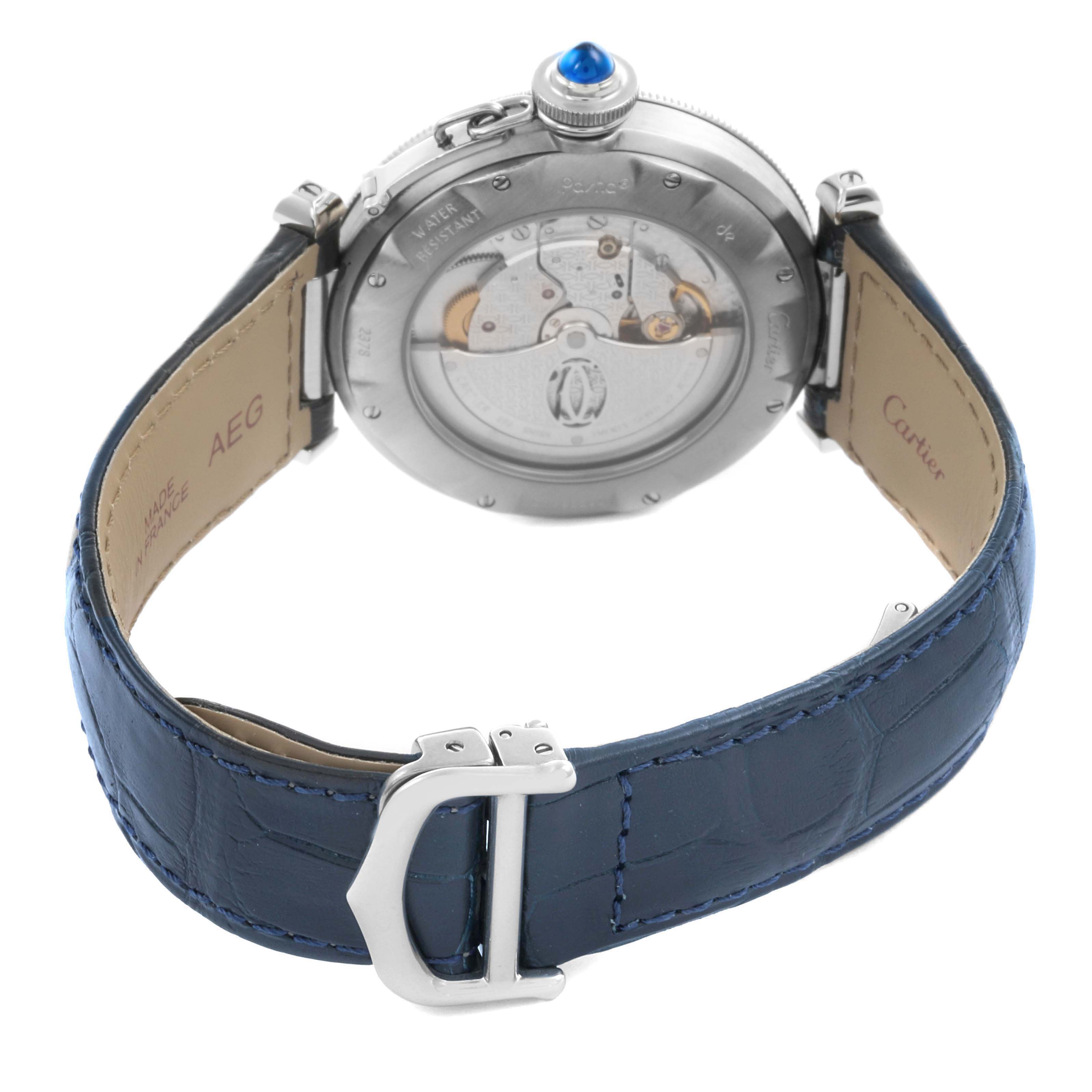 The image shows the back view of the Cartier Pasha W31059H3 Men's Stainless Steel Silver Dial W31059H3 Men's Stainless Steel Silver Dial watch, highlighting its movement and blue leather strap.