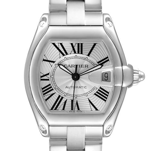 The Cartier Roadster watch is shown from a front angle, highlighting its face, bezel, crown, and part of the bracelet.