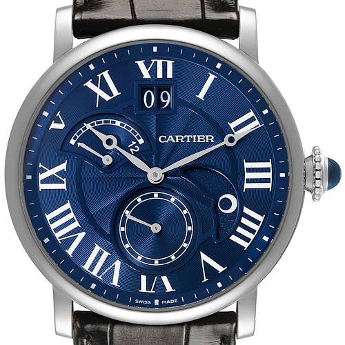 The Rotonde by Cartier is shown from a front angle, displaying its blue dial, Roman numerals, sub-dial, and crown.