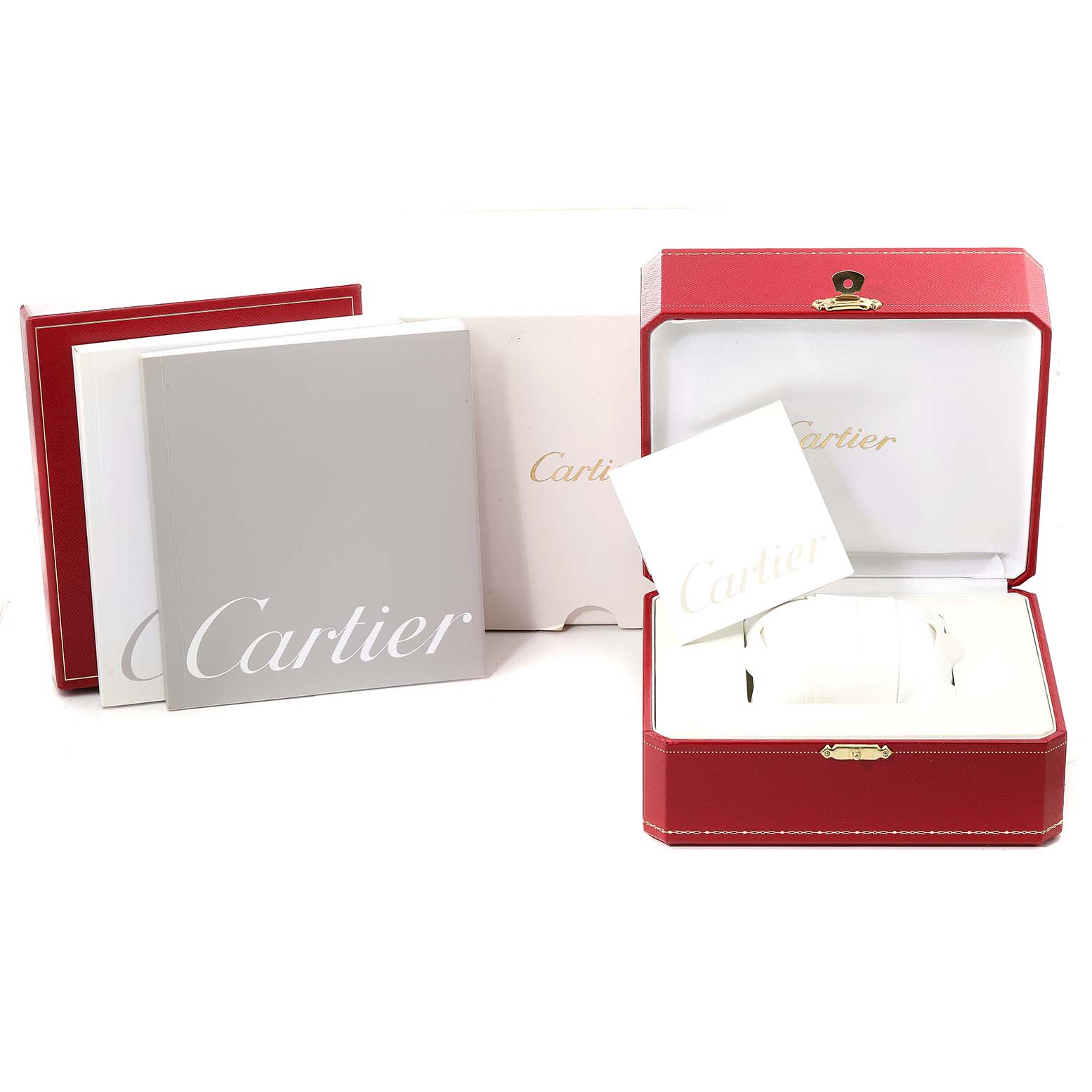 This image shows the packaging and accessories for the Cartier Santos Demoiselle W25066Z6 Women's Steel and Gold (two tone) Silver Dial W25066Z6 Women's Steel and Gold (two tone) Silver Dial watch, including boxes and manuals.