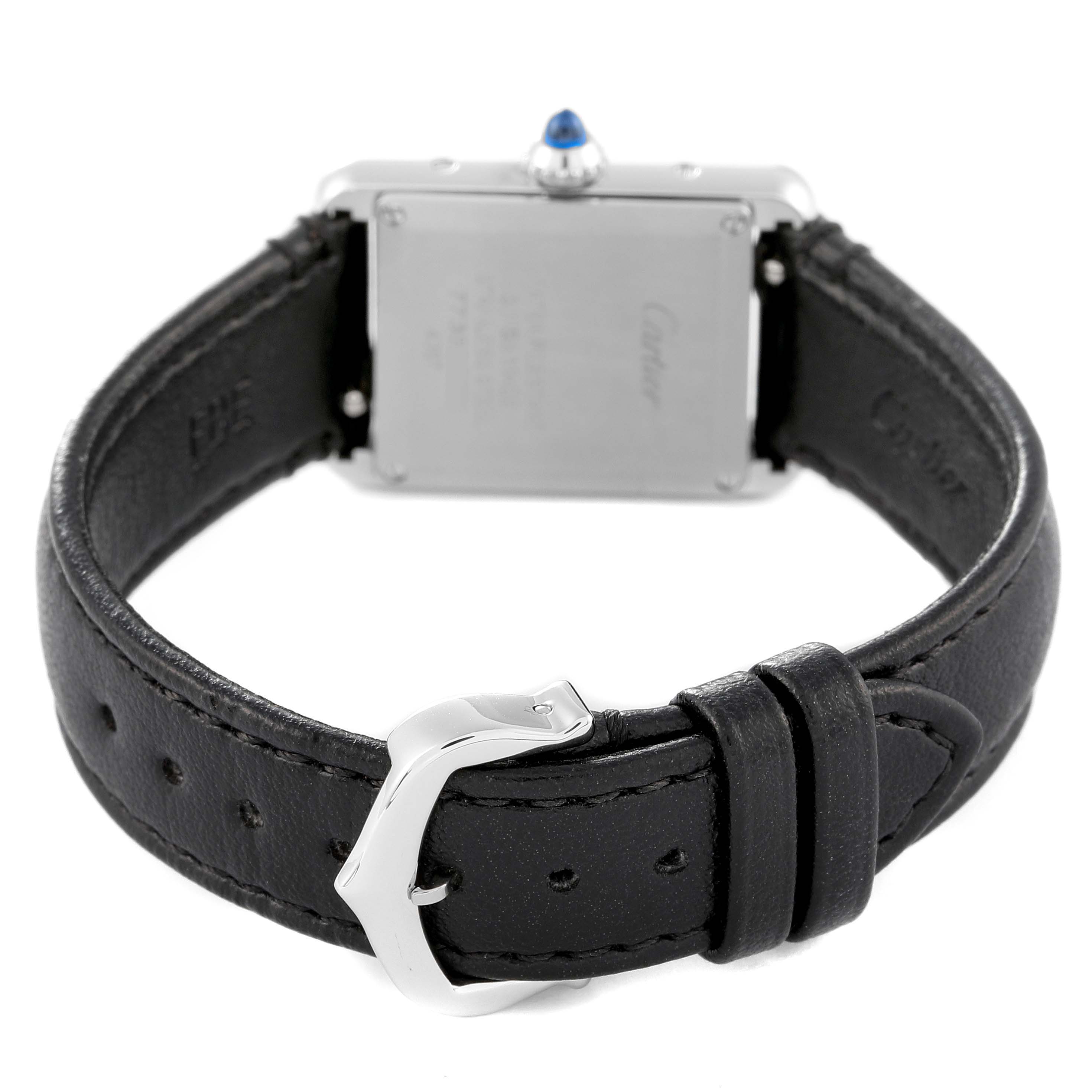 This image shows the back view of the Cartier Tank Solo WSTA0060 Women's Stainless Steel Silver Dial WSTA0060 Women's Stainless Steel Silver Dial watch, highlighting the case back, crown with a blue stone, and black leather strap with buckle.