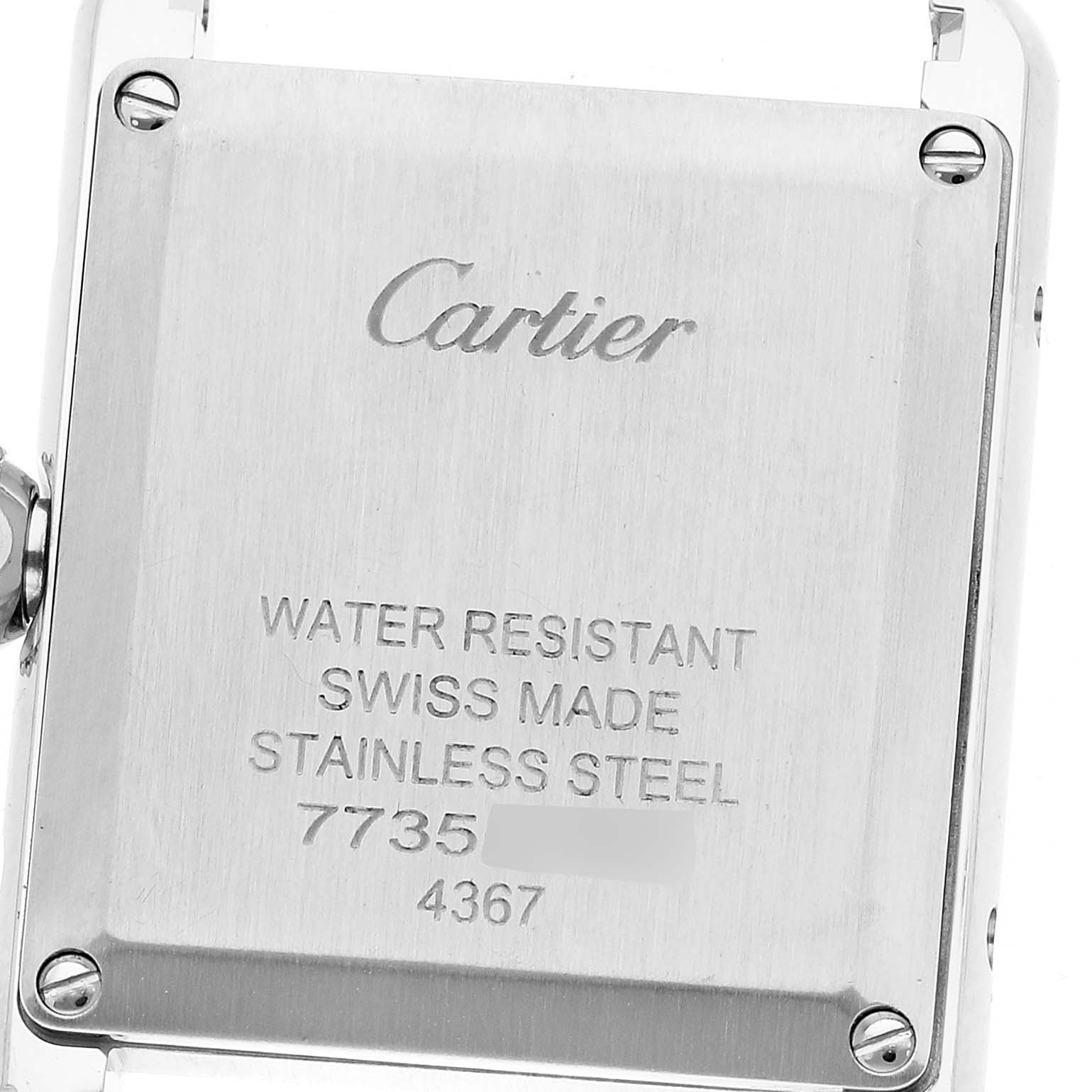 This image shows the back case of a Cartier Tank Solo WSTA0060 Women's Stainless Steel Silver Dial WSTA0060 Women's Stainless Steel Silver Dial watch, displaying details like water resistance and material.