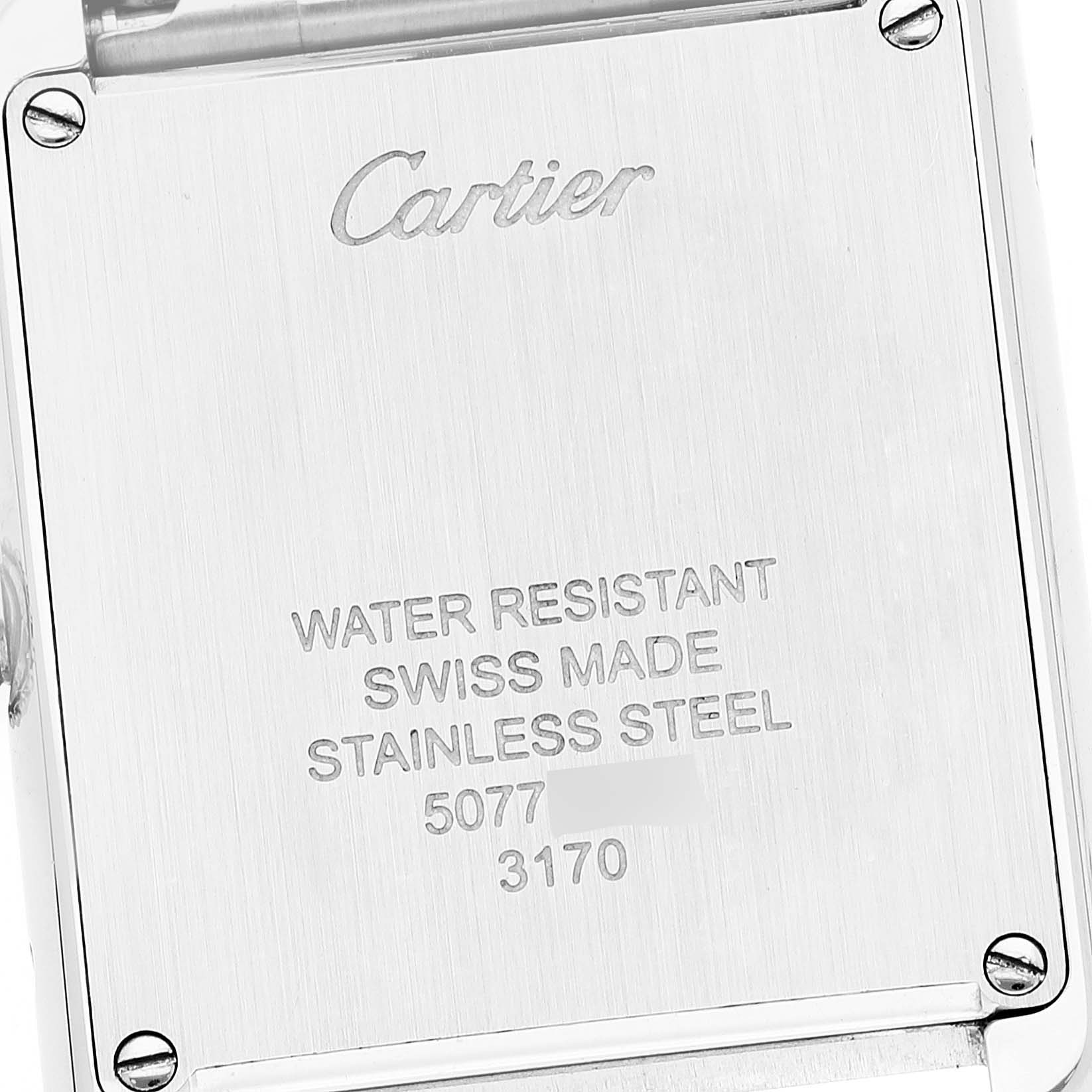 The image shows the backplate of a Cartier Tank Solo W5200013 Women's Stainless Steel Silver Dial W5200013 Women's Stainless Steel Silver Dial watch, highlighting its brand engraving and specifications.
