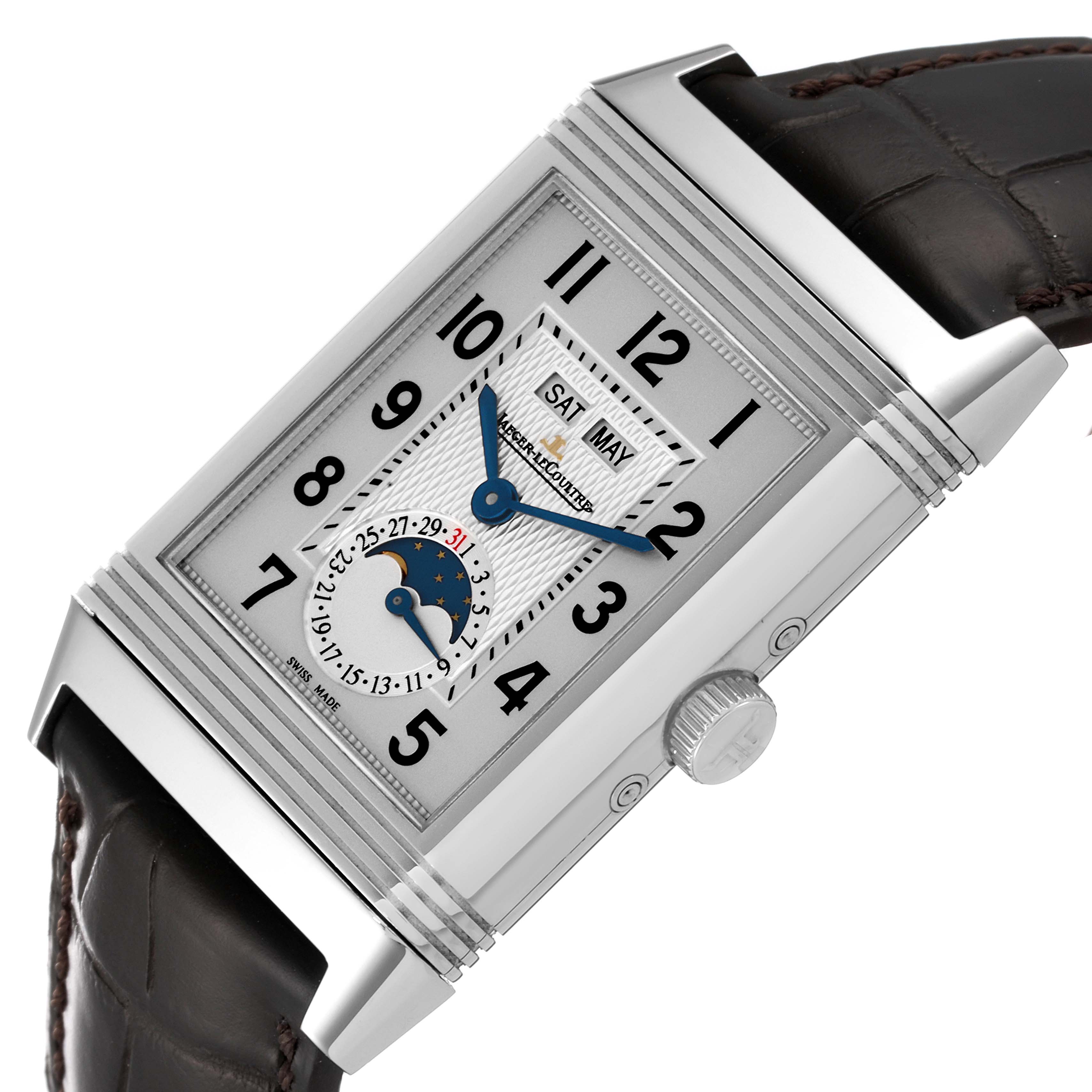The image shows a close-up of the face and side of a Jaeger-LeCoultre Reverso watch, highlighting the dial, crown, and part of the strap.