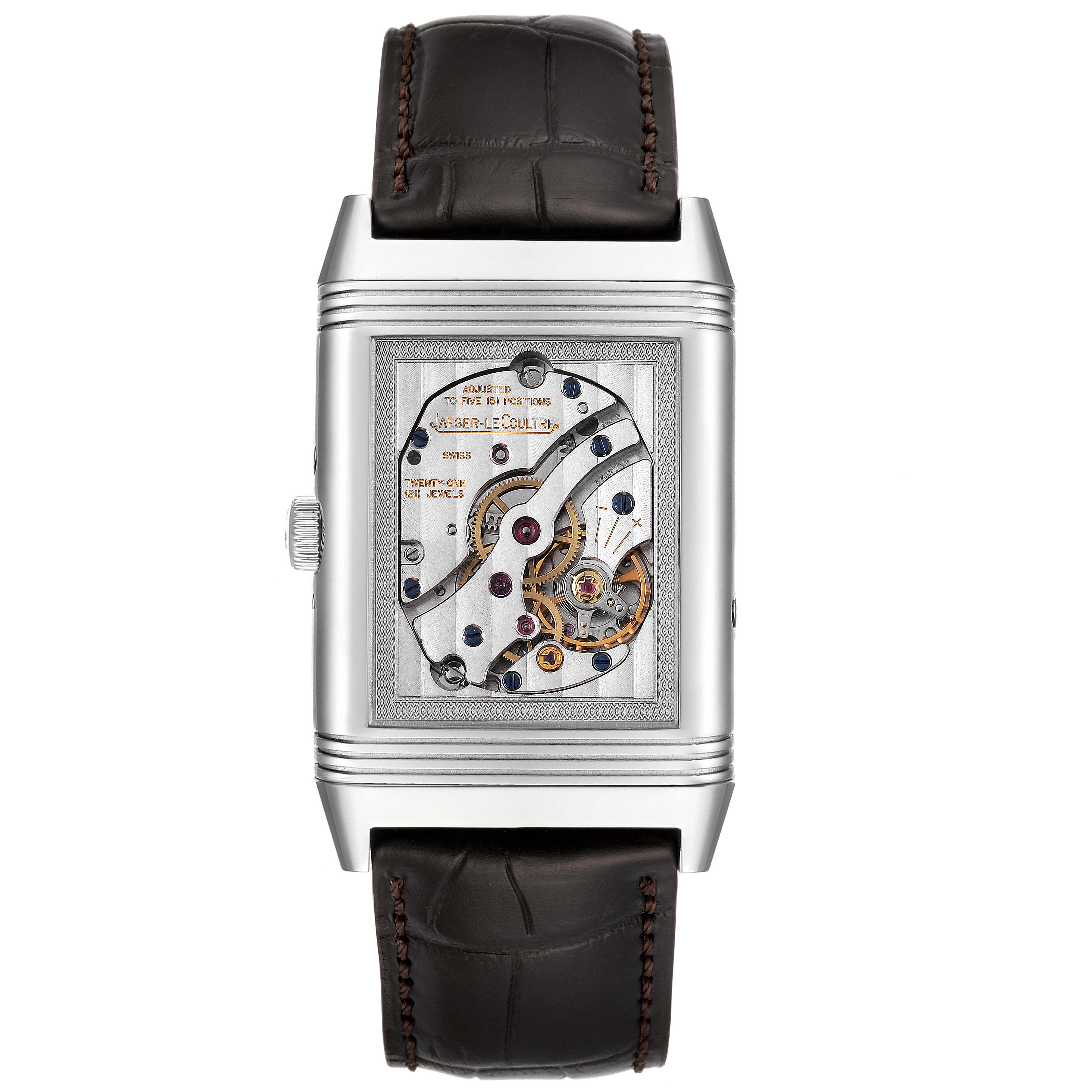 This image shows the back view of the Jaeger-LeCoultre Reverso watch, highlighting its internal mechanism and leather strap.