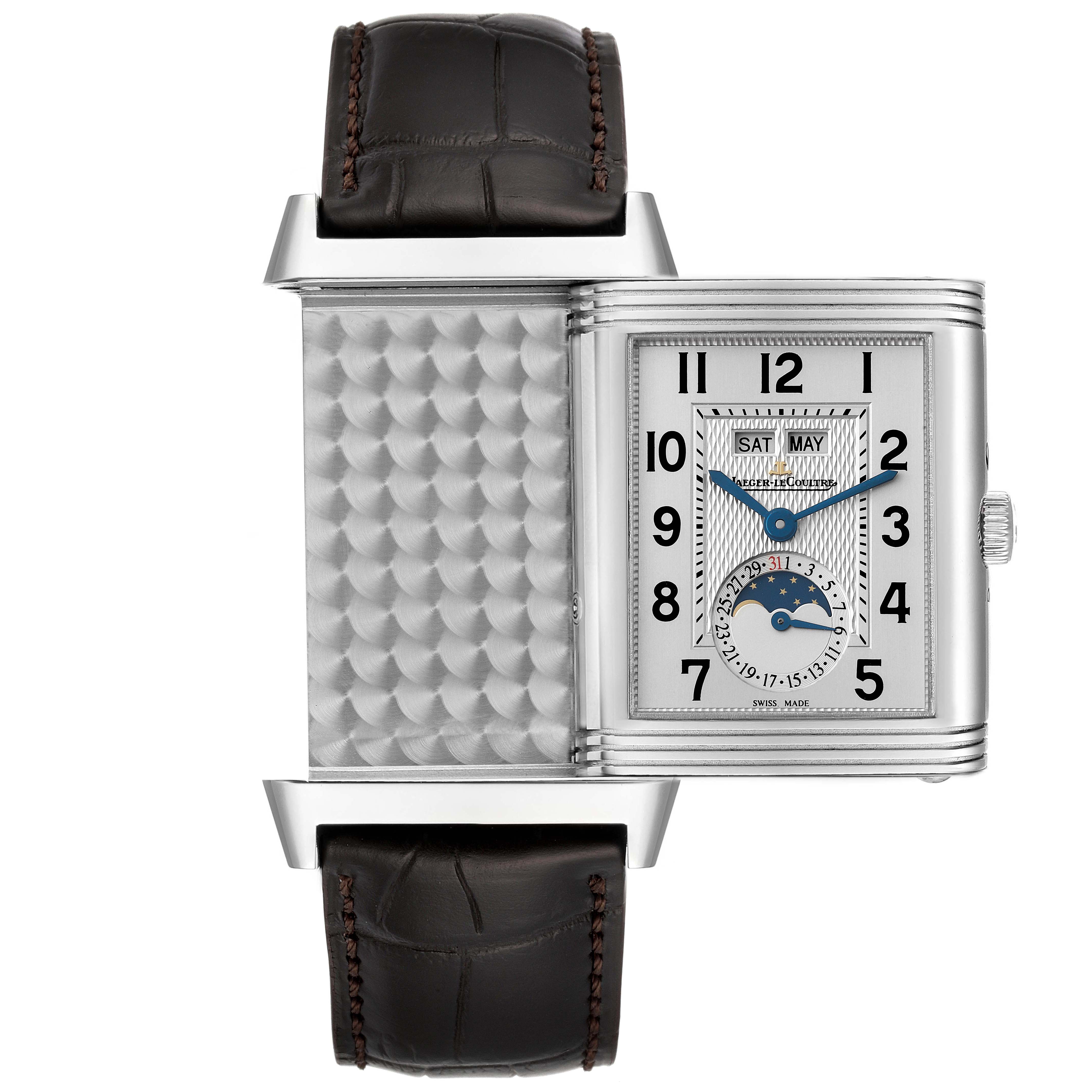The image shows the Jaeger LeCoultre Reverso Q3758420 / 273.8.84 Men
s Stainless Steel Silver Dial Q3758420 / 273.8.84 Men
s Stainless Steel Silver Dial watch in a partially flipped position, displaying both the front dial and the intricate caseback.