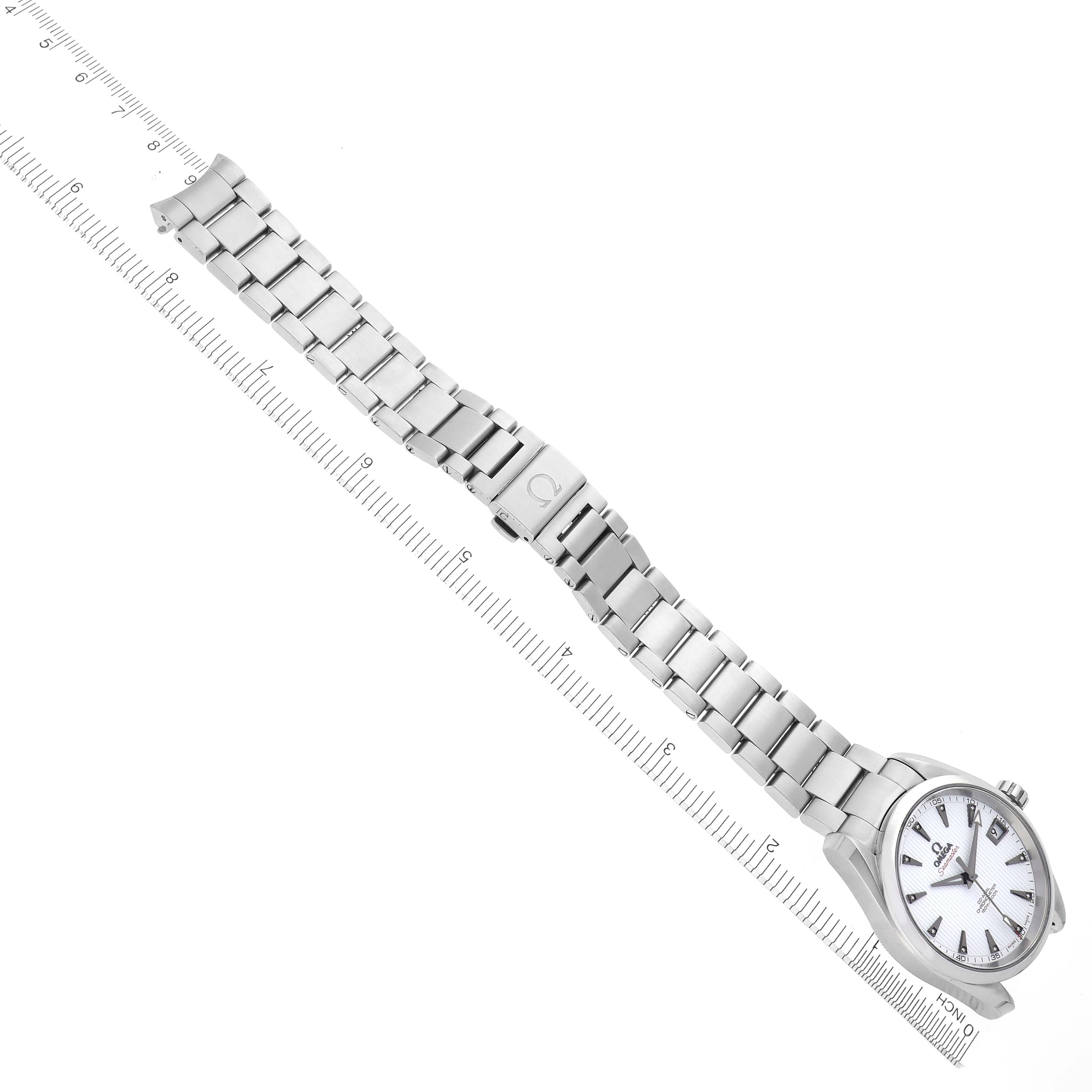 The Omega Seamaster watch is shown at an angle displaying the full bracelet, clasp, and face.