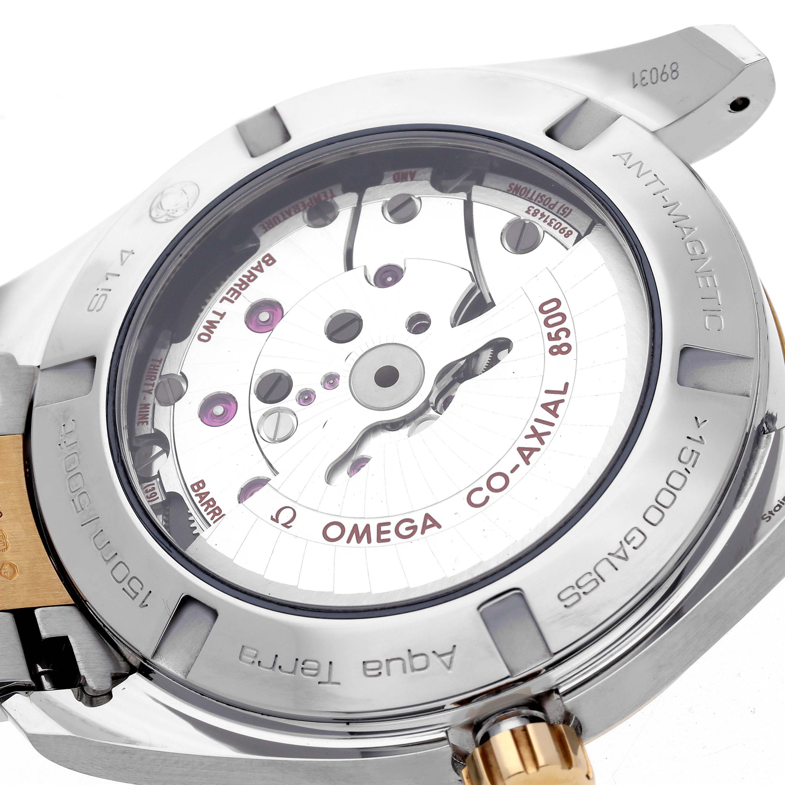 The Omega Seamaster watch is shown from the back, highlighting the Co-Axial movement and antimagnetic features.