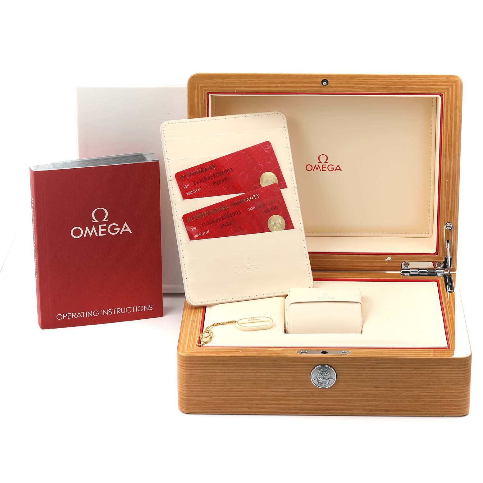 The image shows an open Omega Seamaster 212.30.41.20.01.003 Men
s Stainless Steel Black Dial 212.30.41.20.01.003 Men
s Stainless Steel Black Dial watch box, warranty cards, and operating instructions from a frontal angle.