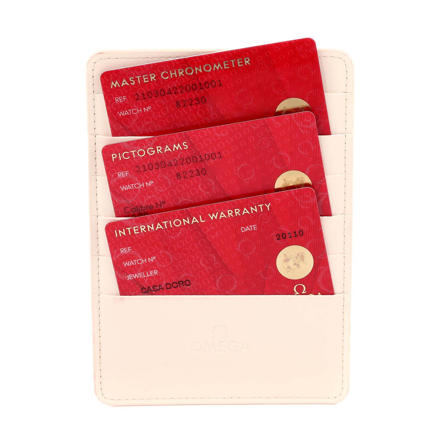 The image shows warranty cards for an Omega Seamaster 210.30.42.20.01.001 Men's Stainless Steel Black Dial 210.30.42.20.01.001 Men's Stainless Steel Black Dial watch in a holder, viewed from a top angle.