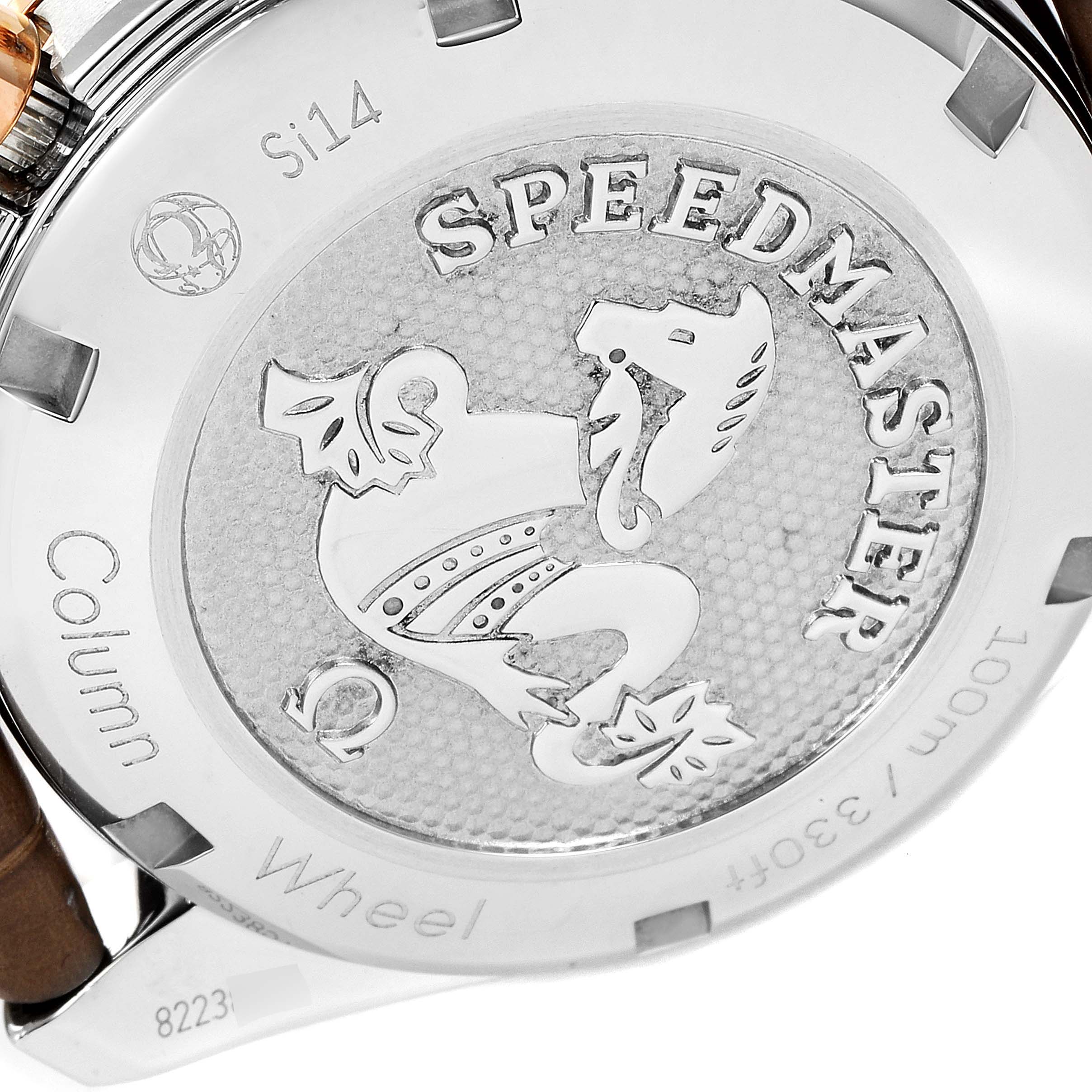 This image shows the case back of the Omega Speedmaster 324.23.38.50.02.002 Men's Steel and Gold (two tone) Silver Dial 324.23.38.50.02.002 Men's Steel and Gold (two tone) Silver Dial watch with engraving details and branding.