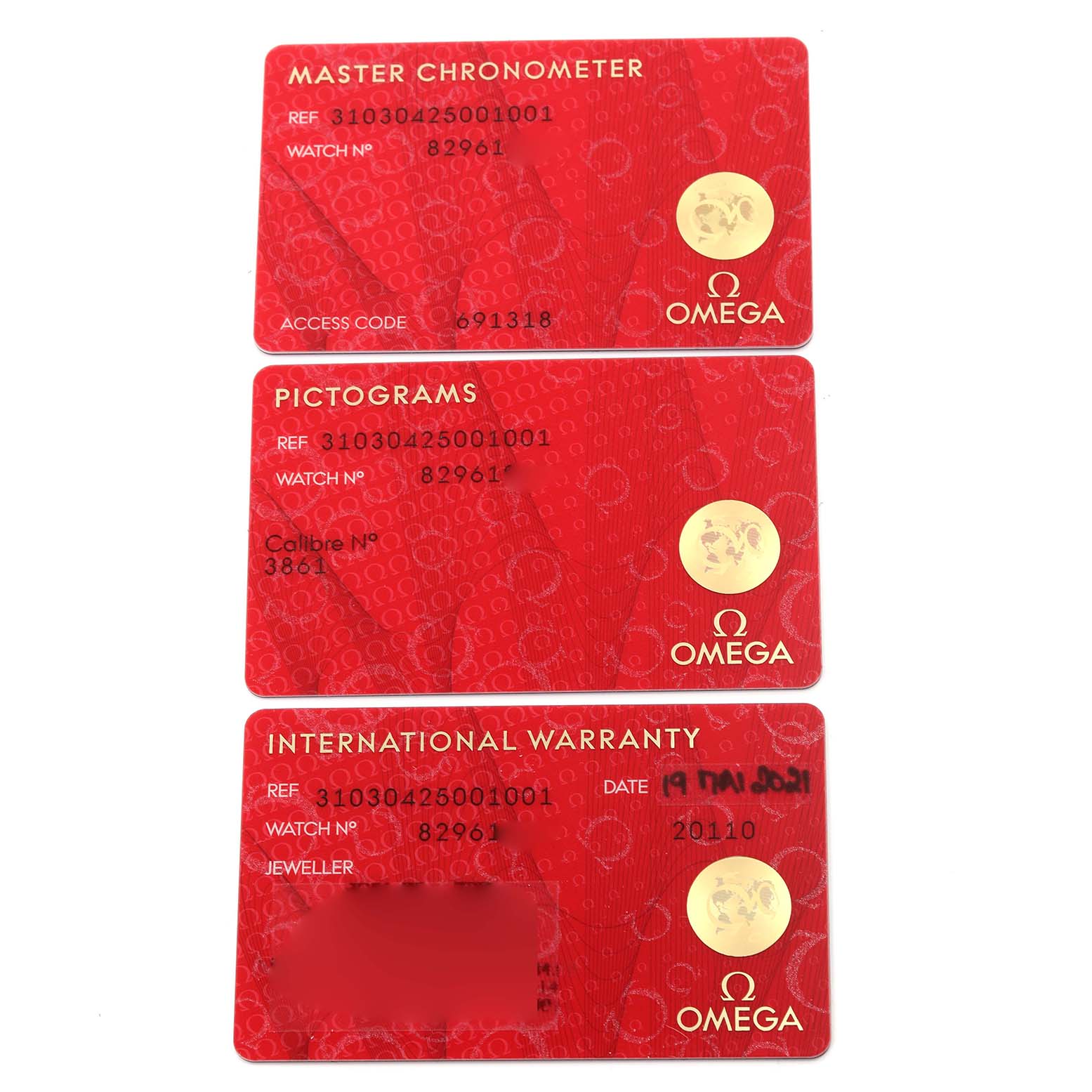 The image shows warranty and certification cards for the Omega Speedmaster 310.30.42.50.01.001 Men
s Stainless Steel Black Dial 310.30.42.50.01.001 Men
s Stainless Steel Black Dial watch.