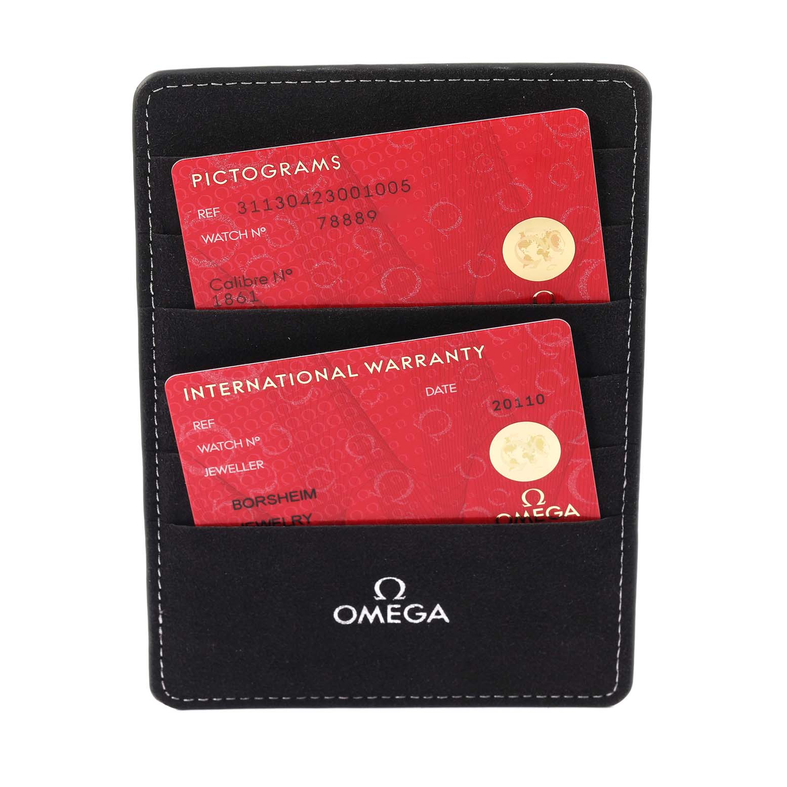 This image shows the warranty and pictogram cards for an Omega Speedmaster 311.30.42.30.01.005 Men's Stainless Steel Black Dial 311.30.42.30.01.005 Men's Stainless Steel Black Dial watch in a black Omega cardholder.