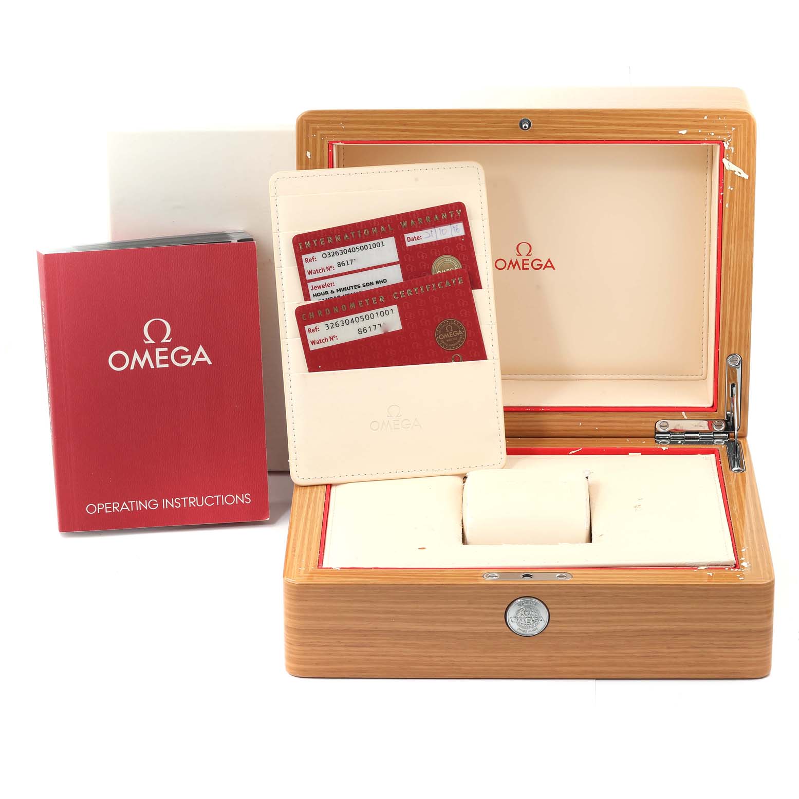 This image shows the packaging box and accessories of the Omega Speedmaster 326.30.40.50.01.001 Men's Stainless Steel Black Dial 326.30.40.50.01.001 Men's Stainless Steel Black Dial, including the warranty cards and operating instructions.
