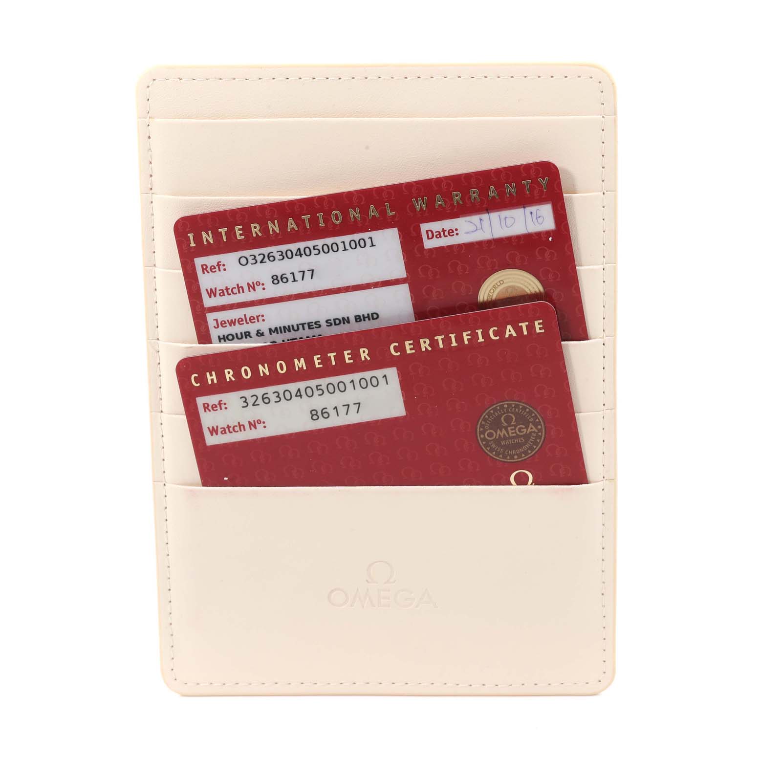 The image shows Omega Speedmaster 326.30.40.50.01.001 Men's Stainless Steel Black Dial 326.30.40.50.01.001 Men's Stainless Steel Black Dial model warranty and chronometer certificate cards in a beige cardholder.