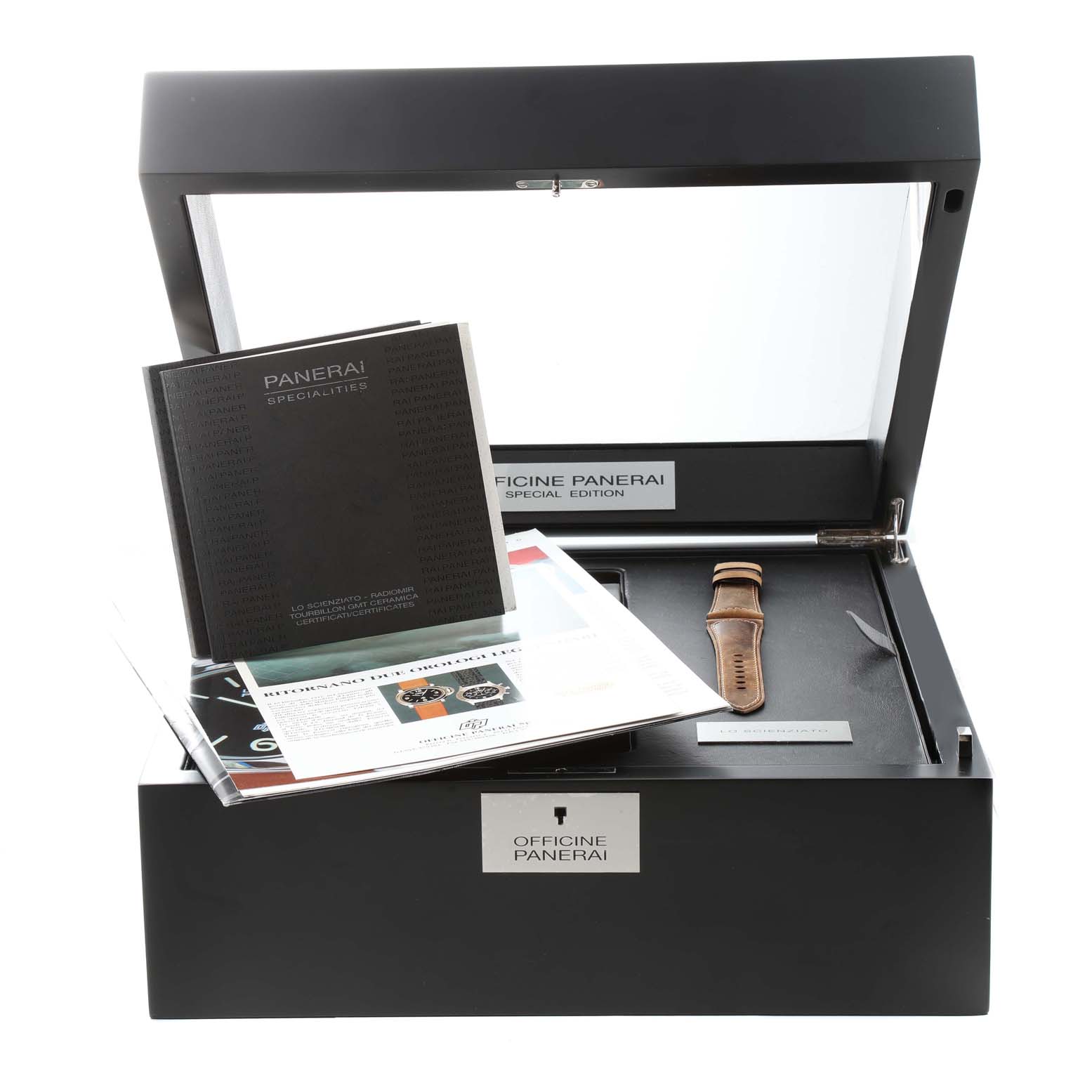 This image shows the Panerai Radiomir PAM00348 Men's Ceramic Transparent Dial PAM00348 Men's Ceramic Transparent Dial watch box including manuals and a leather watch strap from a slightly top-front angle.