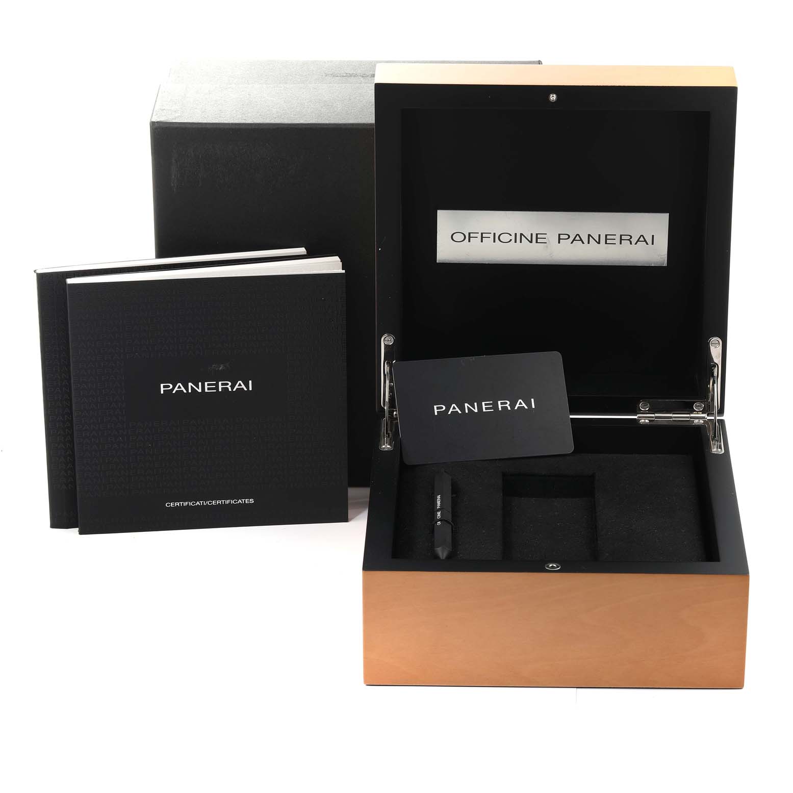 The image shows the packaging and accessories for a Panerai Luminor PAM00723 Men
s Stainless Steel Black Dial PAM00723 Men
s Stainless Steel Black Dial watch, including the box, booklets, and tool.