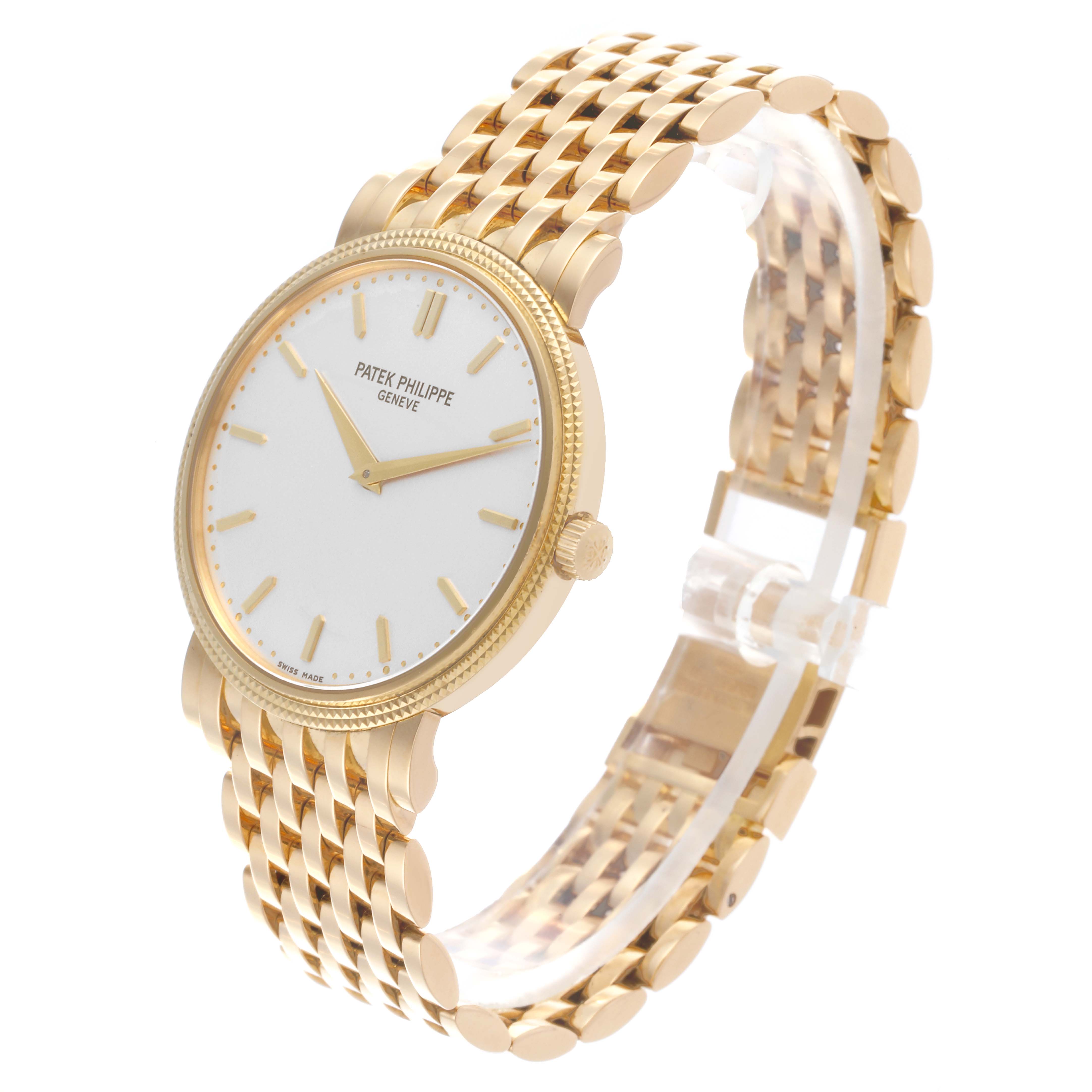 The Patek Philippe Calatrava 5120/1J Men's Yellow Gold Silver Dial 5120/1J Men's Yellow Gold Silver Dial watch is shown at a three-quarter angle, displaying the face, bezel, and part of the bracelet.