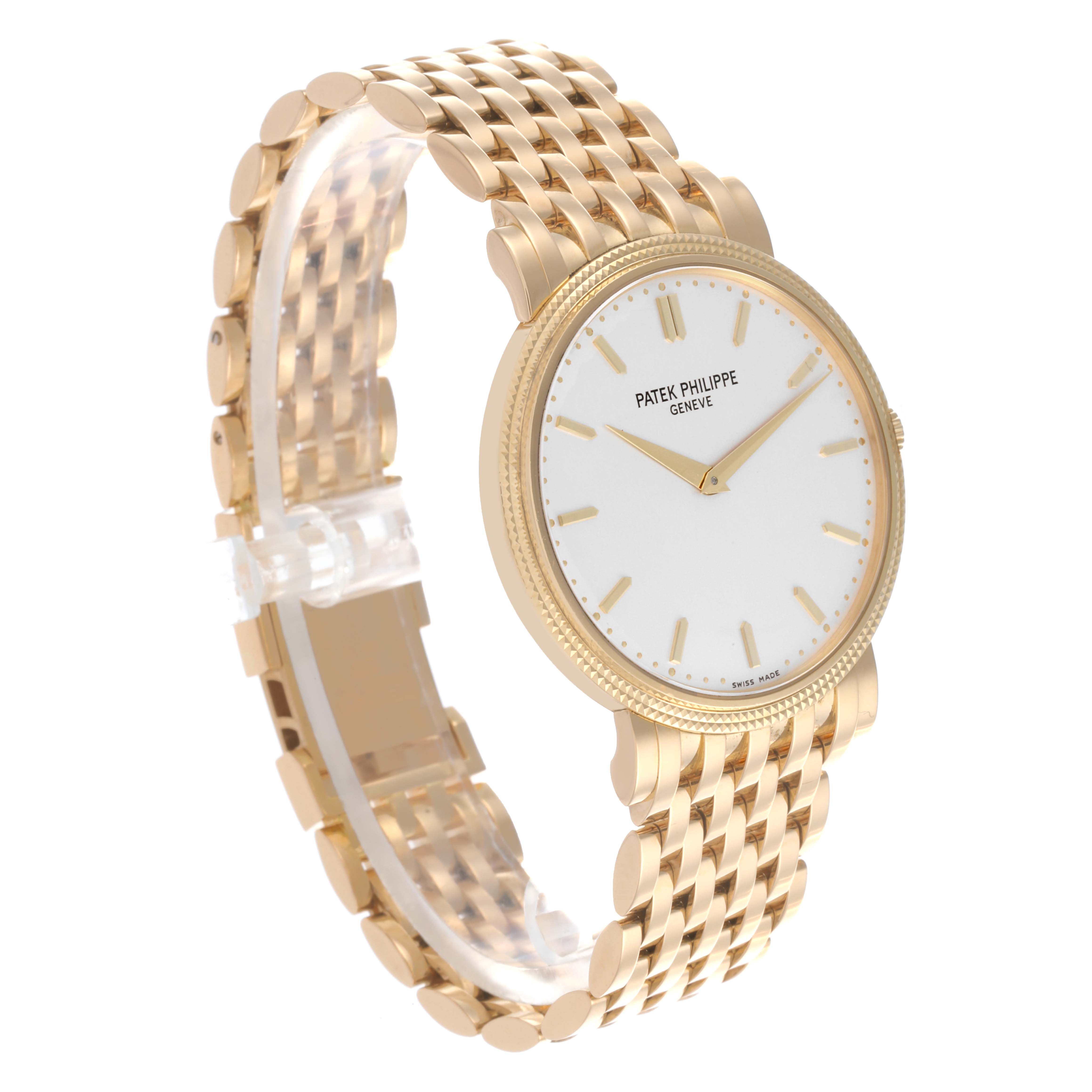 The Patek Philippe Calatrava 5120/1J Men's Yellow Gold Silver Dial 5120/1J Men's Yellow Gold Silver Dial watch is shown at a three-quarter angle, displaying the face, crown, and part of the bracelet.