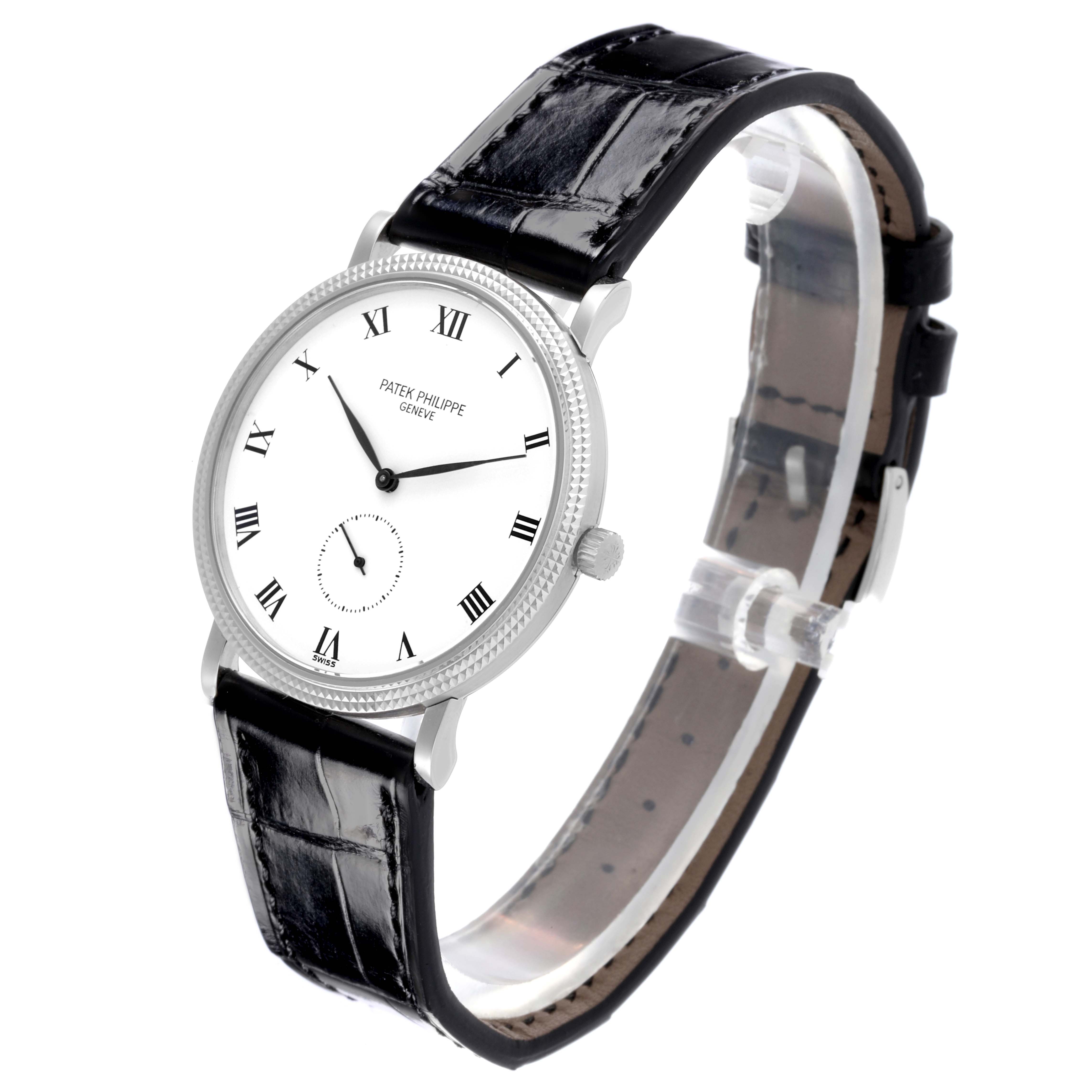 The Patek Philippe Calatrava 3919G-001 Men
s White Gold White Dial 3919G-001 Men
s White Gold White Dial watch is shown at a slight angle, displaying the face, case, crown, and black leather strap.