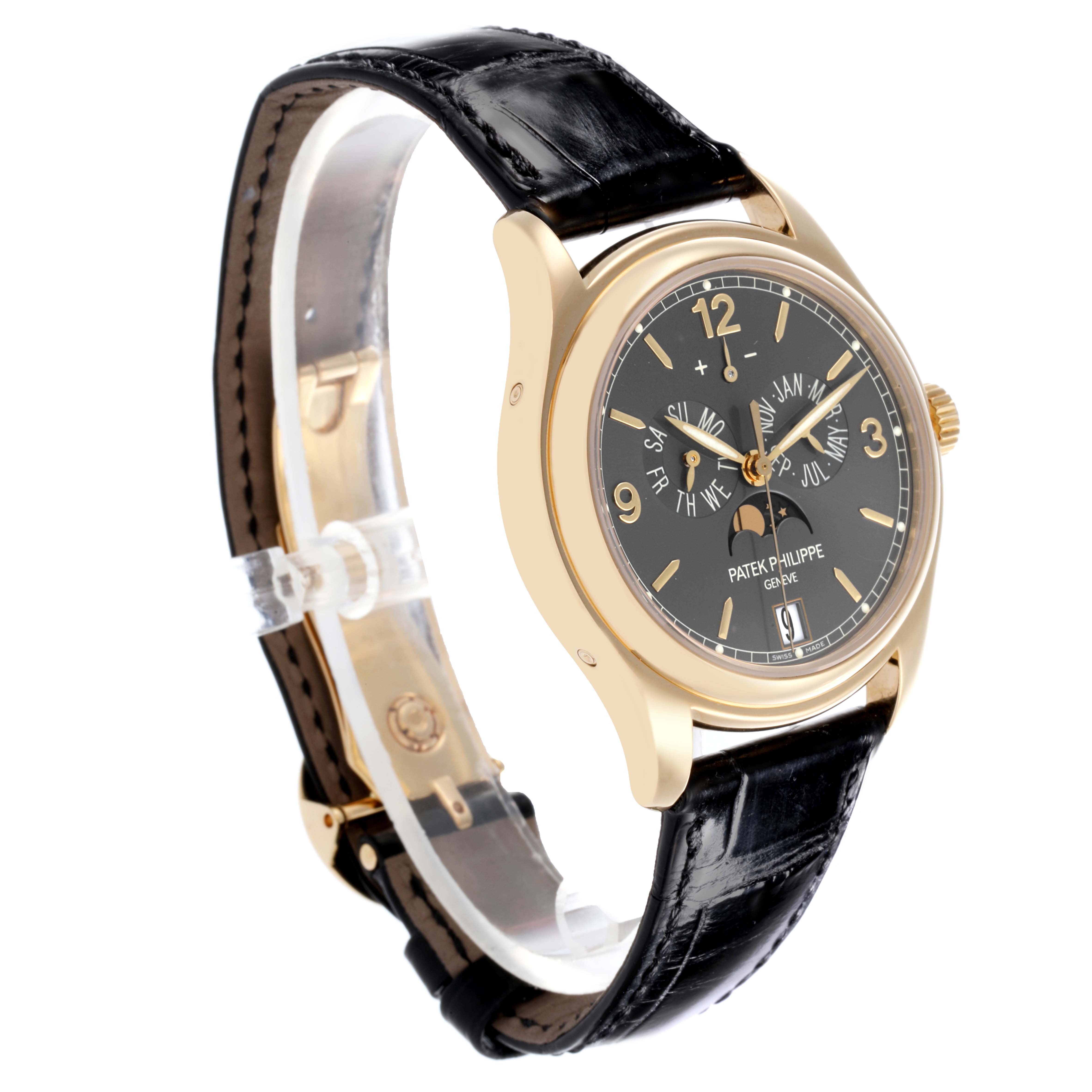 The Patek Philippe Complications 5146J-010 Men's Yellow Gold Grey Dial 5146J-010 Men's Yellow Gold Grey Dial watch is shown from a three-quarter angle, revealing the face, side crown, and black leather strap.