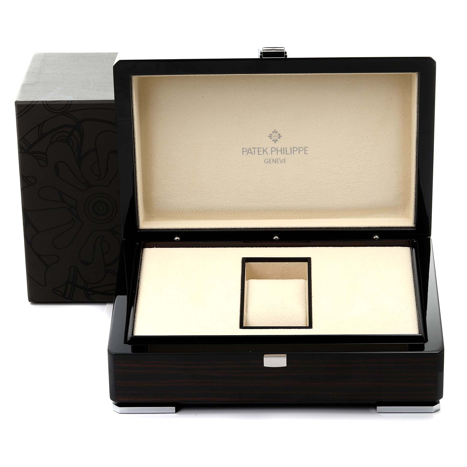 The image shows an open Patek Philippe Complications 5146J-010 Men's Yellow Gold Grey Dial 5146J-010 Men's Yellow Gold Grey Dial watch box from a top angle, highlighting the interior lining.