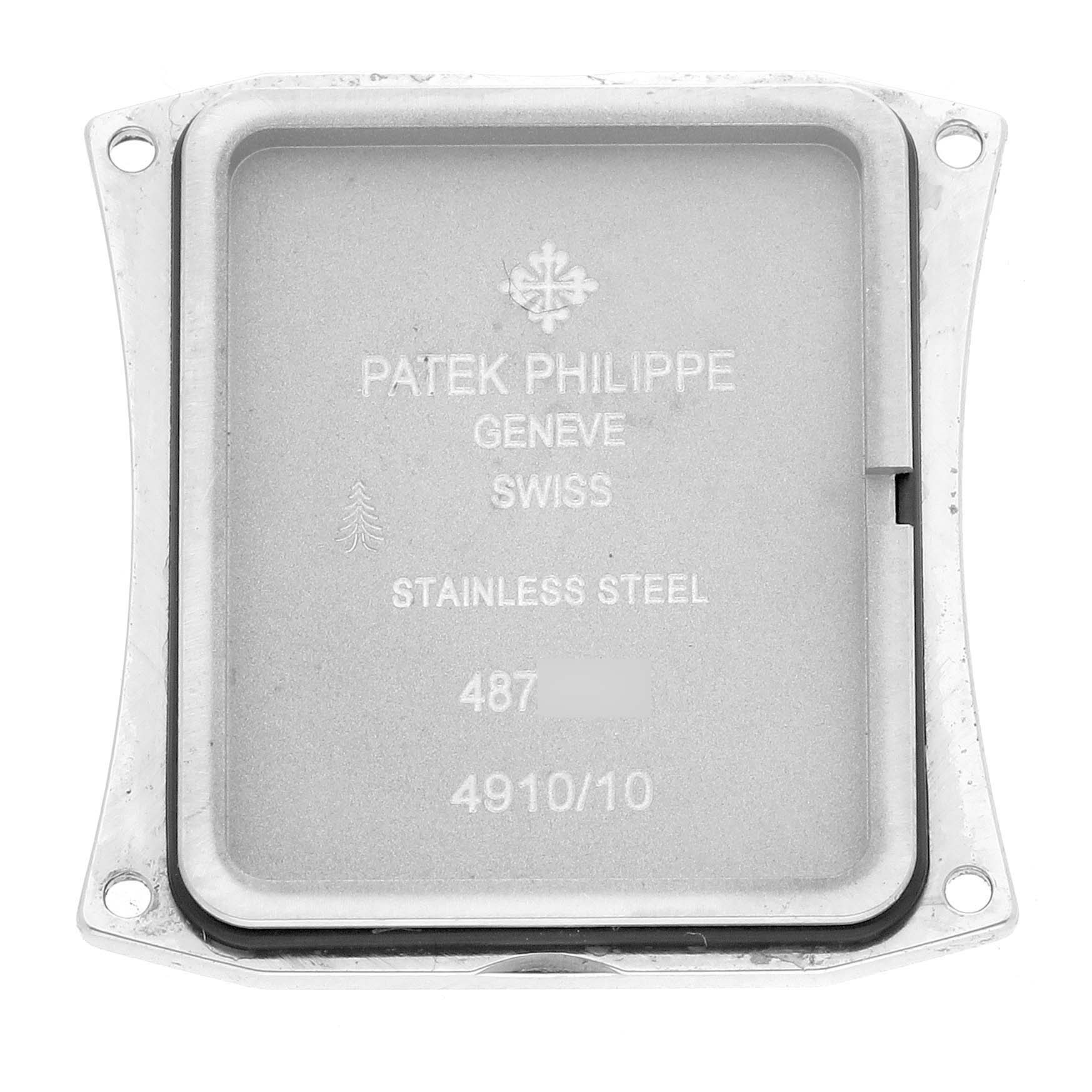 The image shows the back case of a Patek Philippe Twenty-4 4910/10A-012 Women's Stainless Steel Blue Dial 4910/10A-012 Women's Stainless Steel Blue Dial watch, displaying engravings and details.