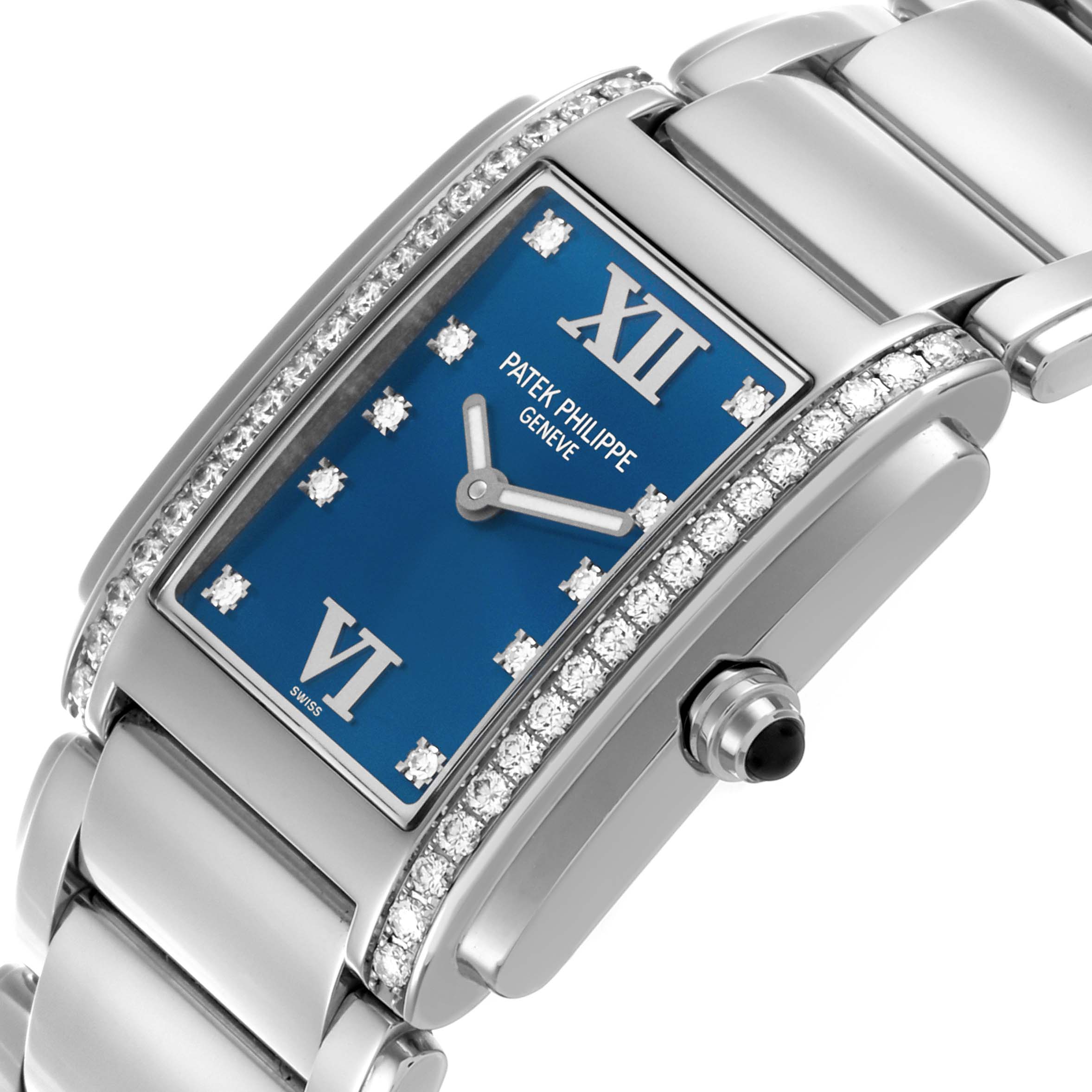 The image shows a close-up angle of the Patek Philippe Twenty-4 4910/10A-012 Women's Stainless Steel Blue Dial 4910/10A-012 Women's Stainless Steel Blue Dial watch's blue dial, diamond bezel, and stainless steel bracelet.
