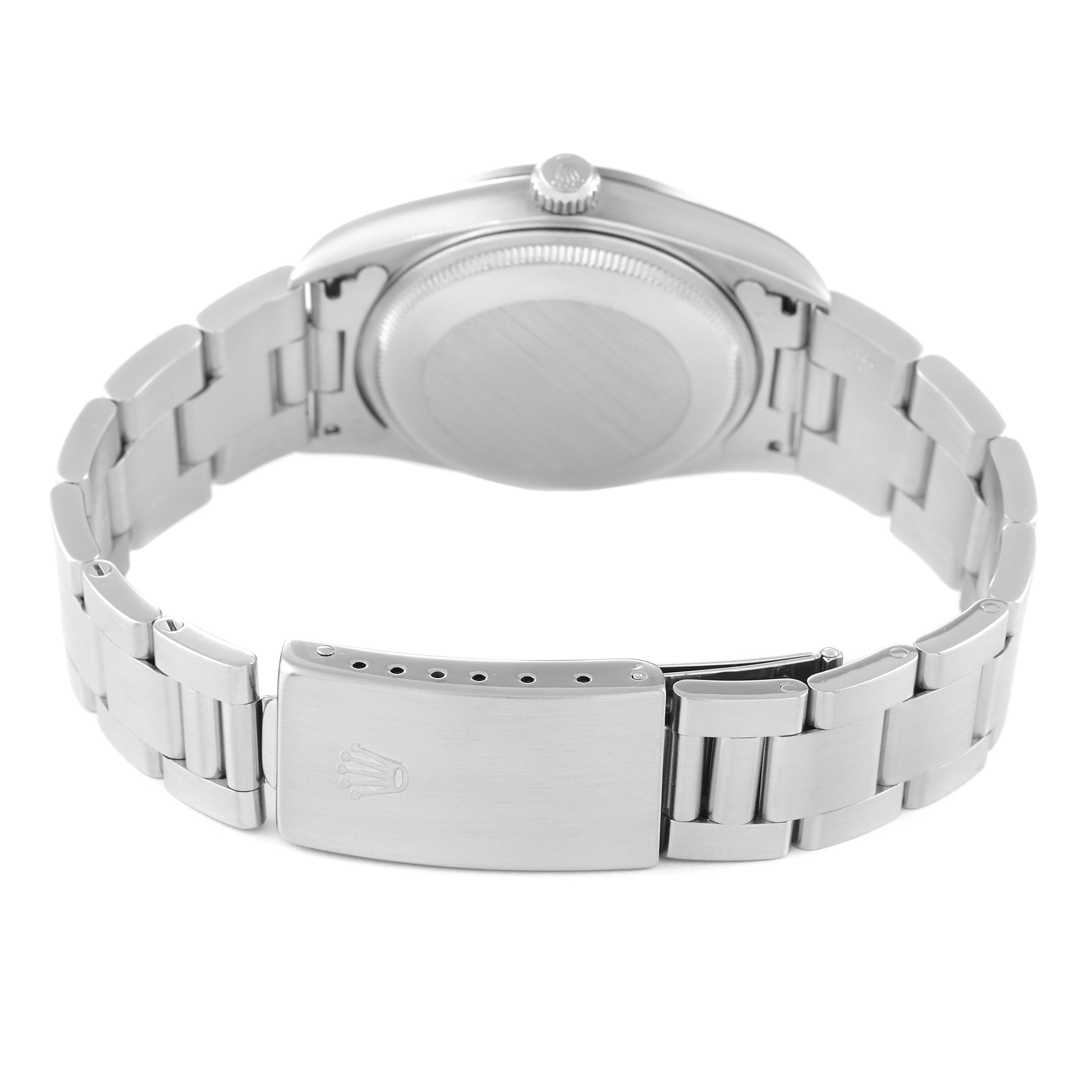 The image shows the back view of a Rolex Air-King 14000M Men's Stainless Steel Black Dial 14000M Men's Stainless Steel Black Dial watch, highlighting the case back, crown, and the bracelet with a clasp.