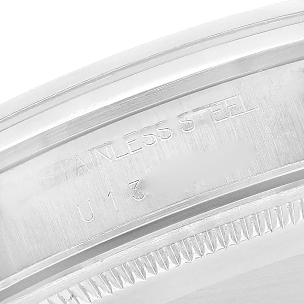 The image shows a close-up of the stainless steel case and engraved details on a Rolex Air-King 14000M Men's Stainless Steel Black Dial 14000M Men's Stainless Steel Black Dial watch.