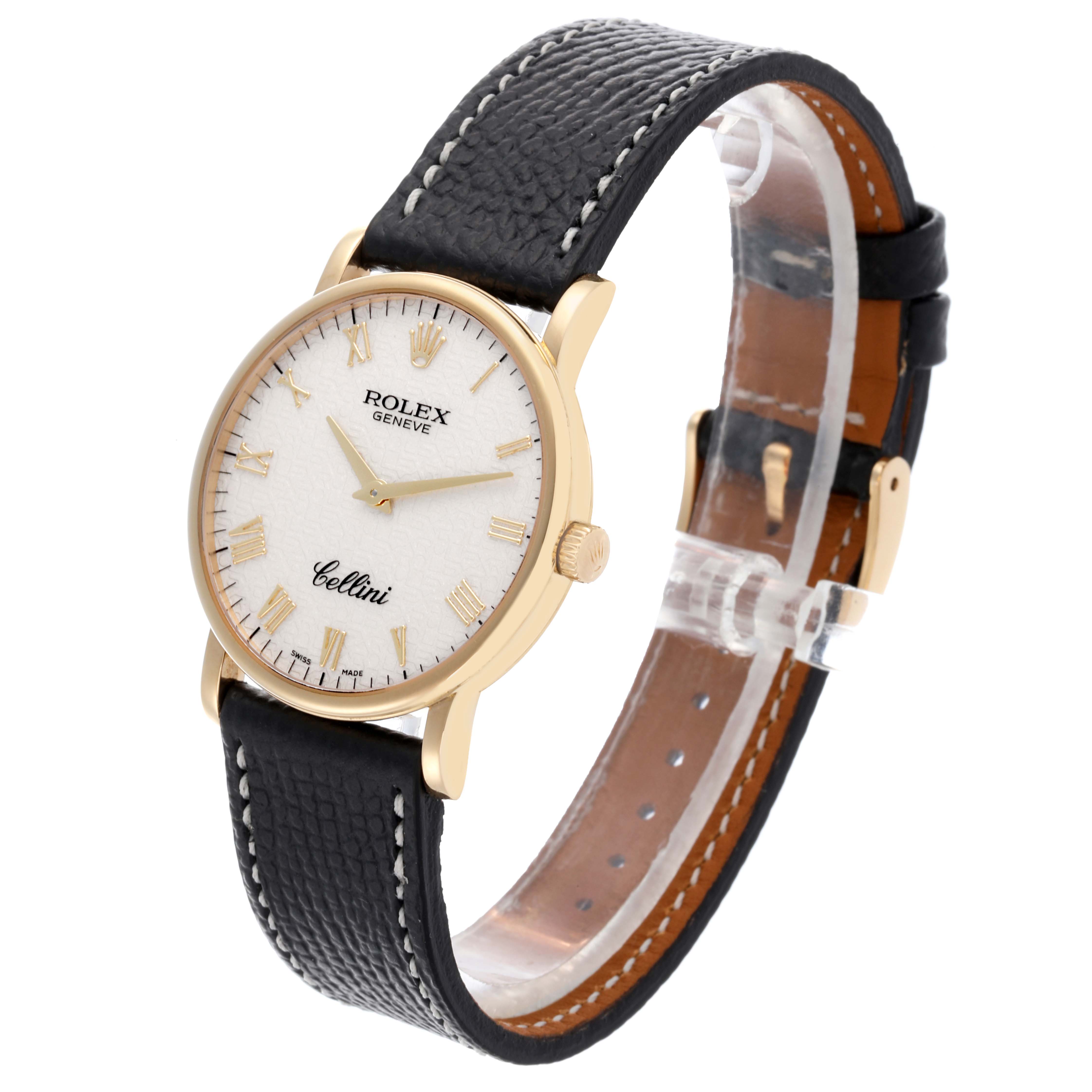 The Rolex Cellini 5115 Men's Yellow Gold White Dial 5115 Men's Yellow Gold White Dial watch is shown at a slight angle, highlighting the face, gold case, and leather strap.