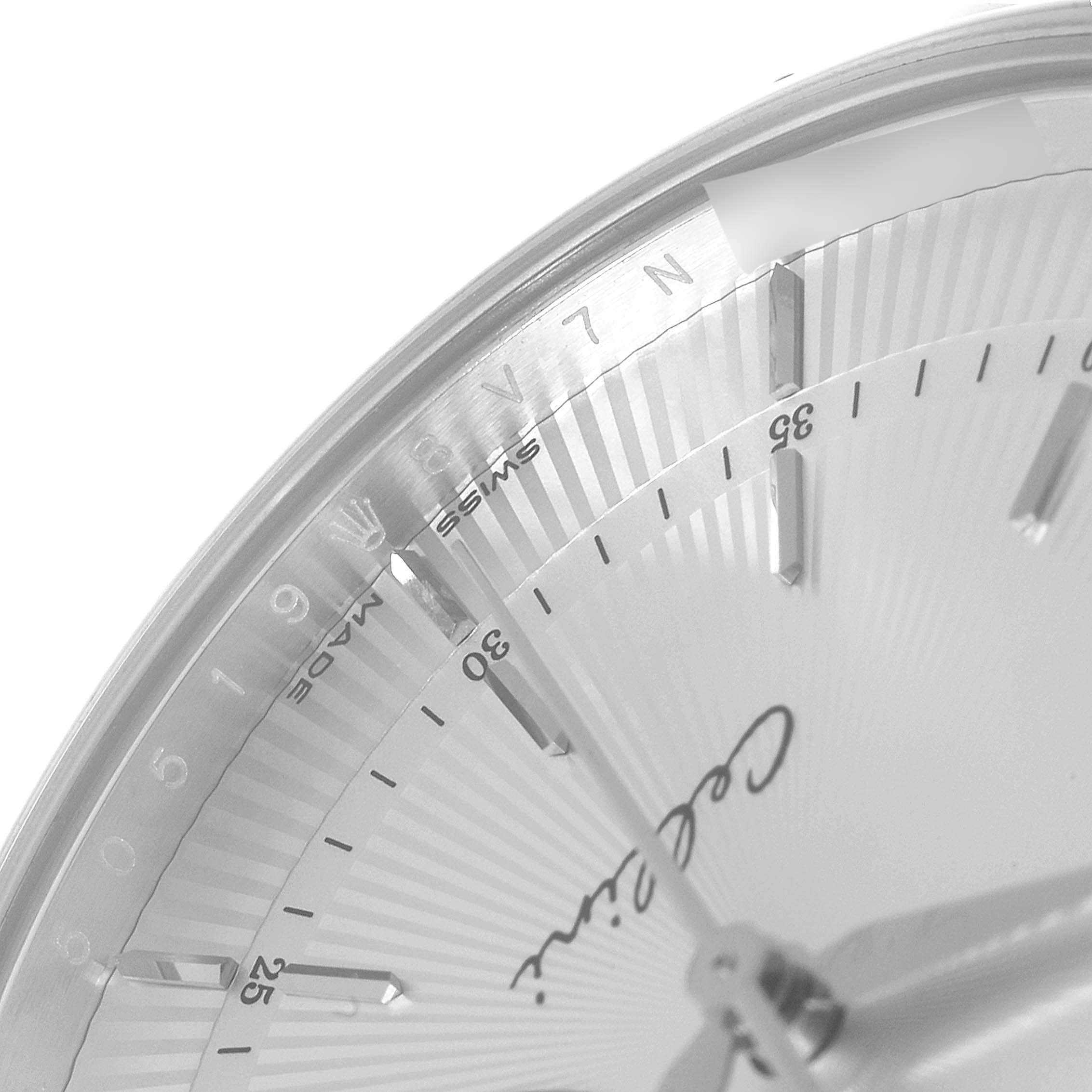 This image shows a close-up of the dial and bezel of a Rolex Cellini 50519 Men
s White Gold Silver Dial 50519 Men
s White Gold Silver Dial watch, highlighting the minute markers and part of the logo.
