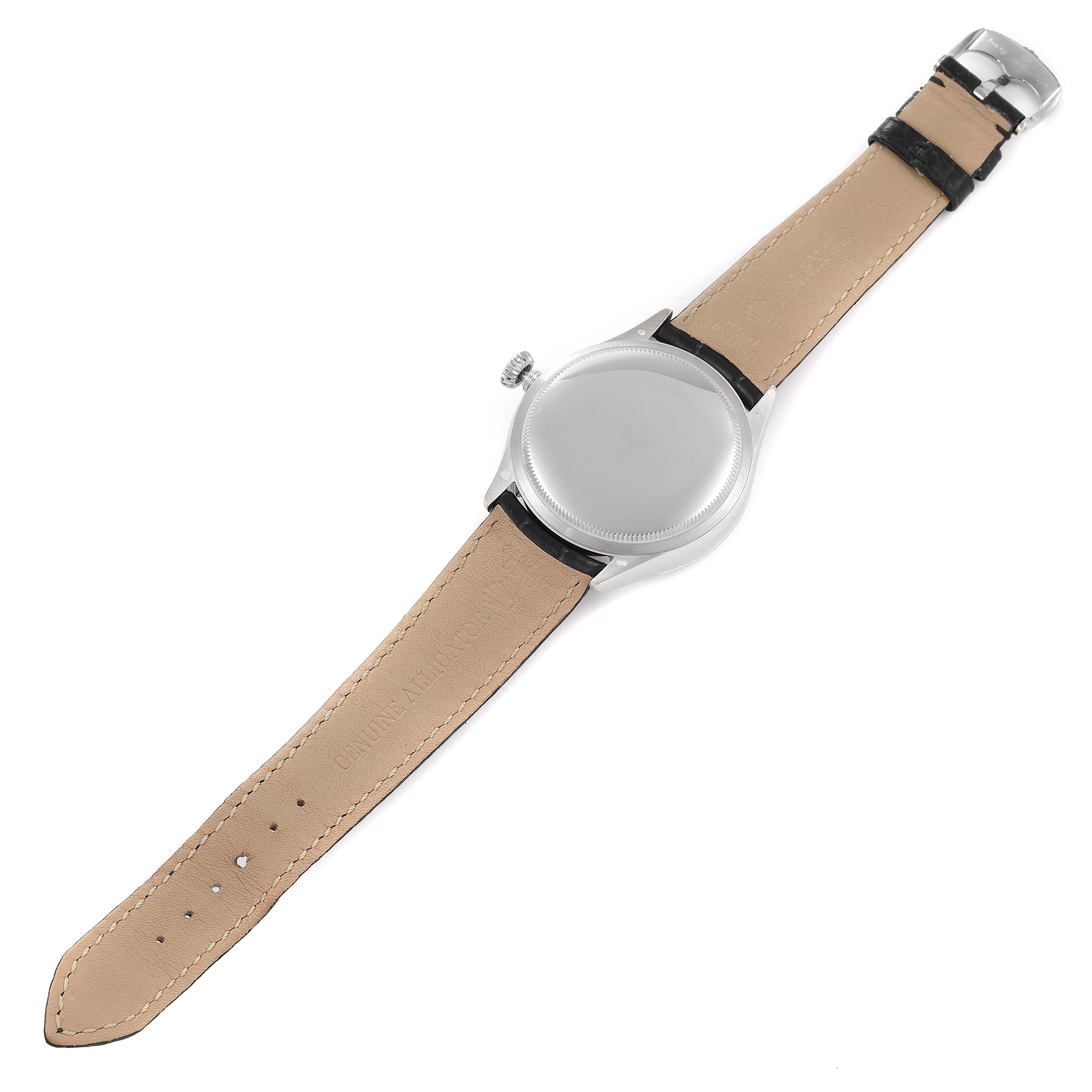 The image shows the back view of a Rolex Cellini 50519 Men
s White Gold Silver Dial 50519 Men
s White Gold Silver Dial watch, highlighting the leather strap and case back.