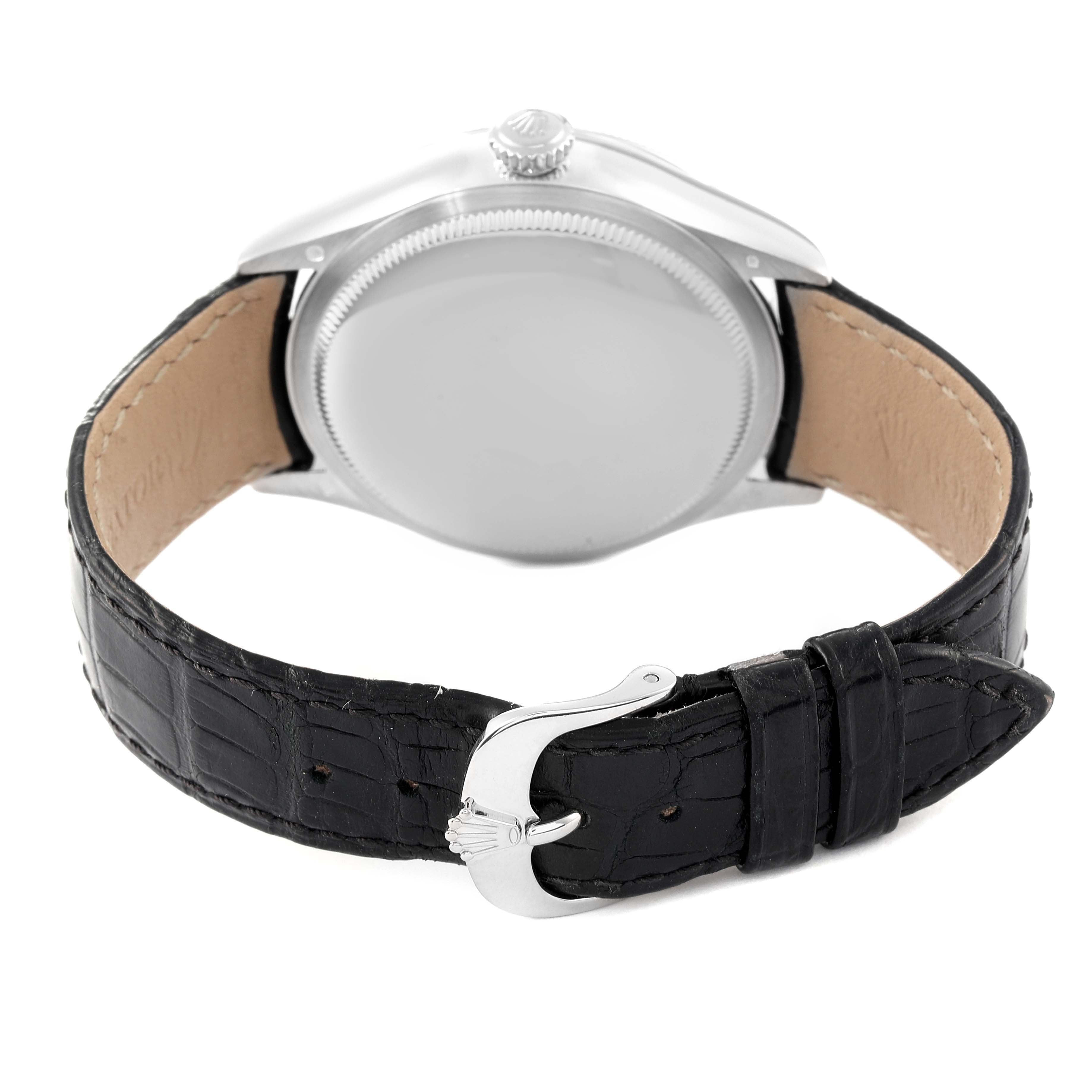 The image shows the back case and black leather strap with a buckle of the Rolex Cellini 50519 Men
s White Gold Silver Dial 50519 Men
s White Gold Silver Dial model watch from a rear angle.