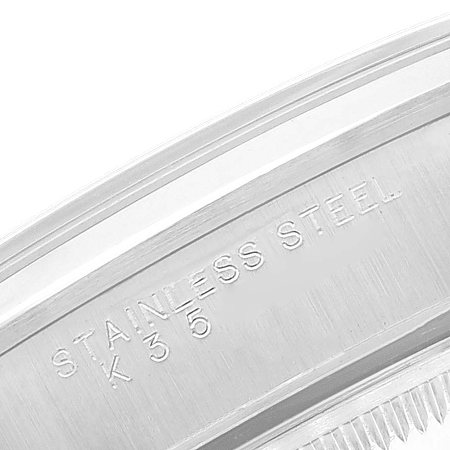 The image shows a close-up of the side engraving on a stainless steel Rolex Date 15200 Men
s Stainless Steel Black Dial 15200 Men
s Stainless Steel Black Dial model watch.