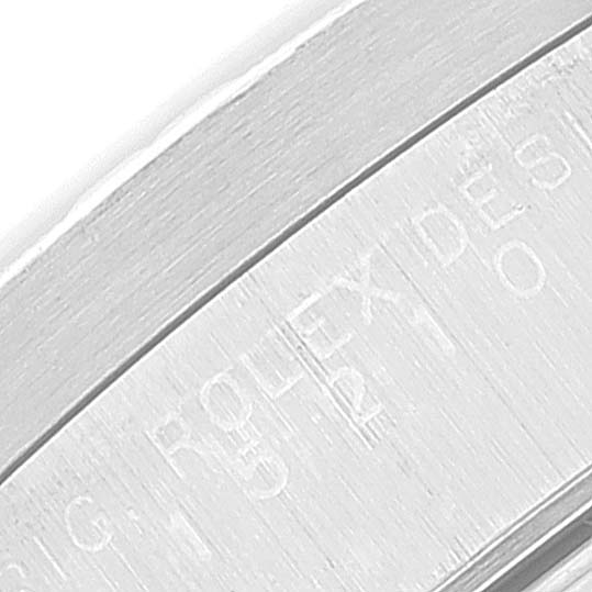 Close-up shot of the rehaut engraving on a Rolex Date 15210 Men
s Stainless Steel Black Dial 15210 Men
s Stainless Steel Black Dial model watch.