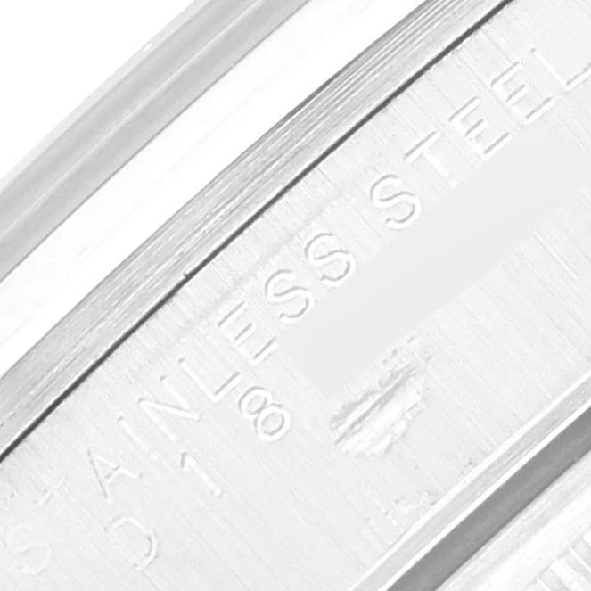 This image shows an extreme close-up of the side engraving on a Rolex Date 15200 Men's Stainless Steel White Dial 15200 Men's Stainless Steel White Dial watch, highlighting the "STAINLESS STEEL" inscription.