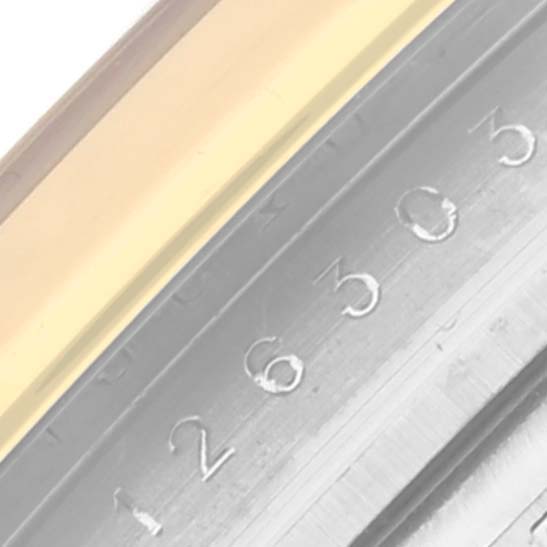 The image shows a close-up of the Rolex Datejust 41 126303 Men's Steel and Gold (two tone) Champagne Dial 126303 Men's Steel and Gold (two tone) Champagne Dial bezel, focusing on the engraved reference number.