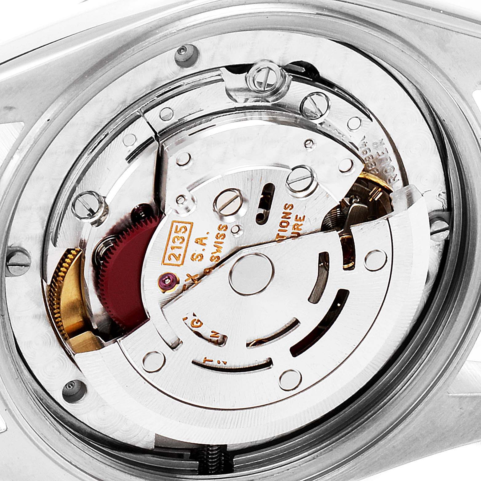 The image shows the internal mechanism of a mid-size Rolex watch model, taken from the back side.