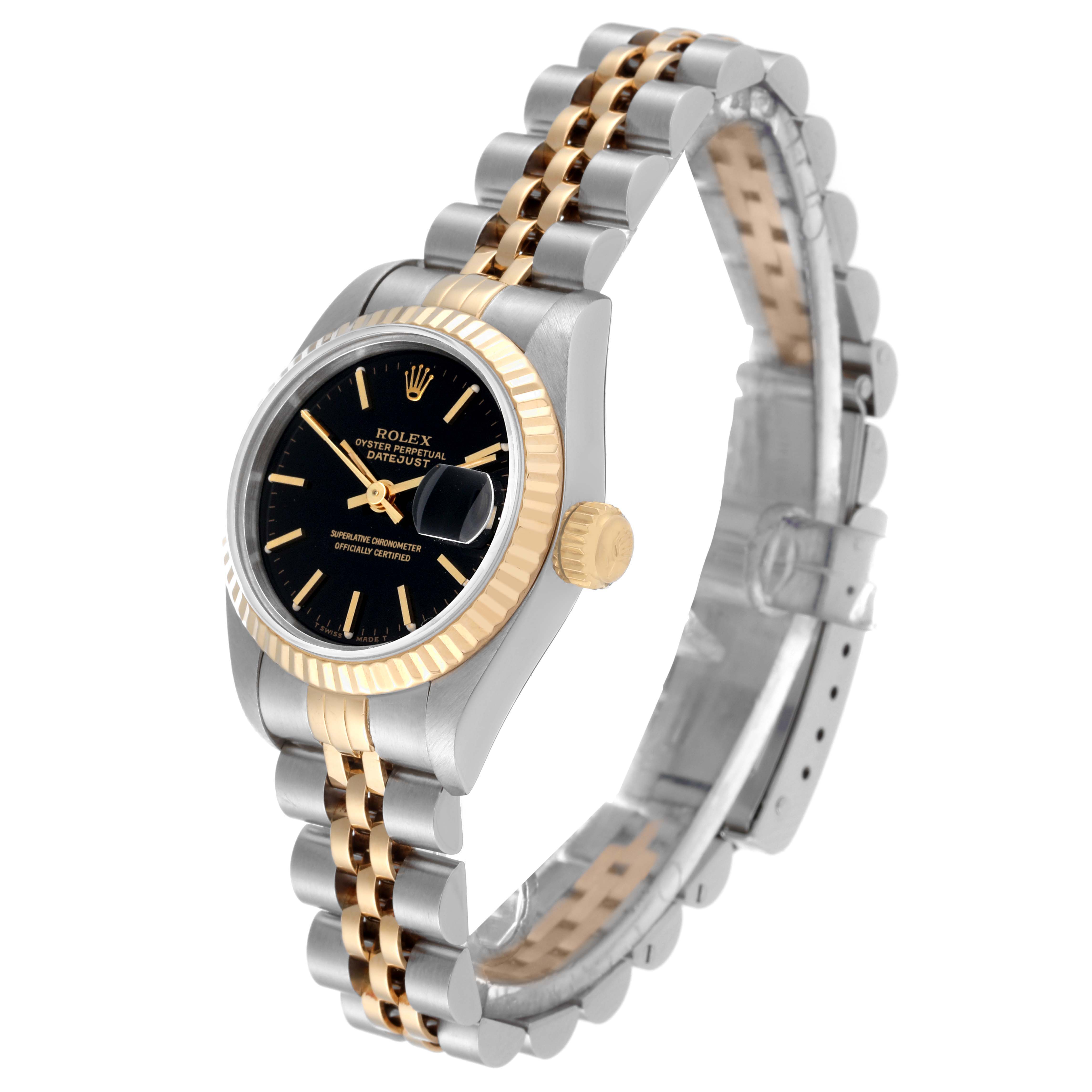 This image shows a Rolex Datejust 69173 Women's Steel and Gold (two tone) Black Dial 69173 Women's Steel and Gold (two tone) Black Dial watch at an angled top-down view, displaying the dial, bezel, and part of the Jubilee bracelet.