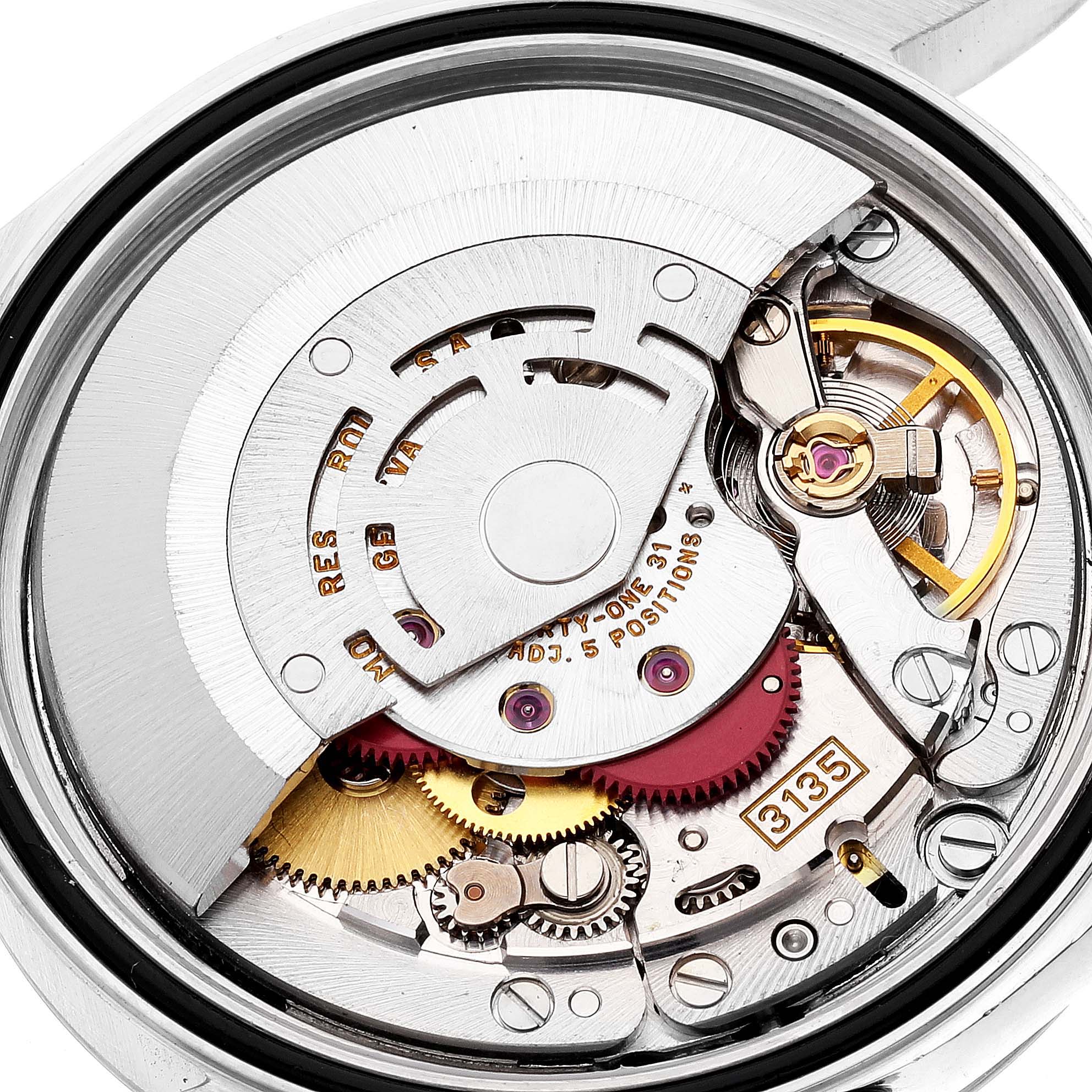 The image shows the movement and internal mechanics of a Rolex Datejust 16233 Men's Steel and Gold (two tone) Black Dial 16233 Men's Steel and Gold (two tone) Black Dial watch from a close-up angle.