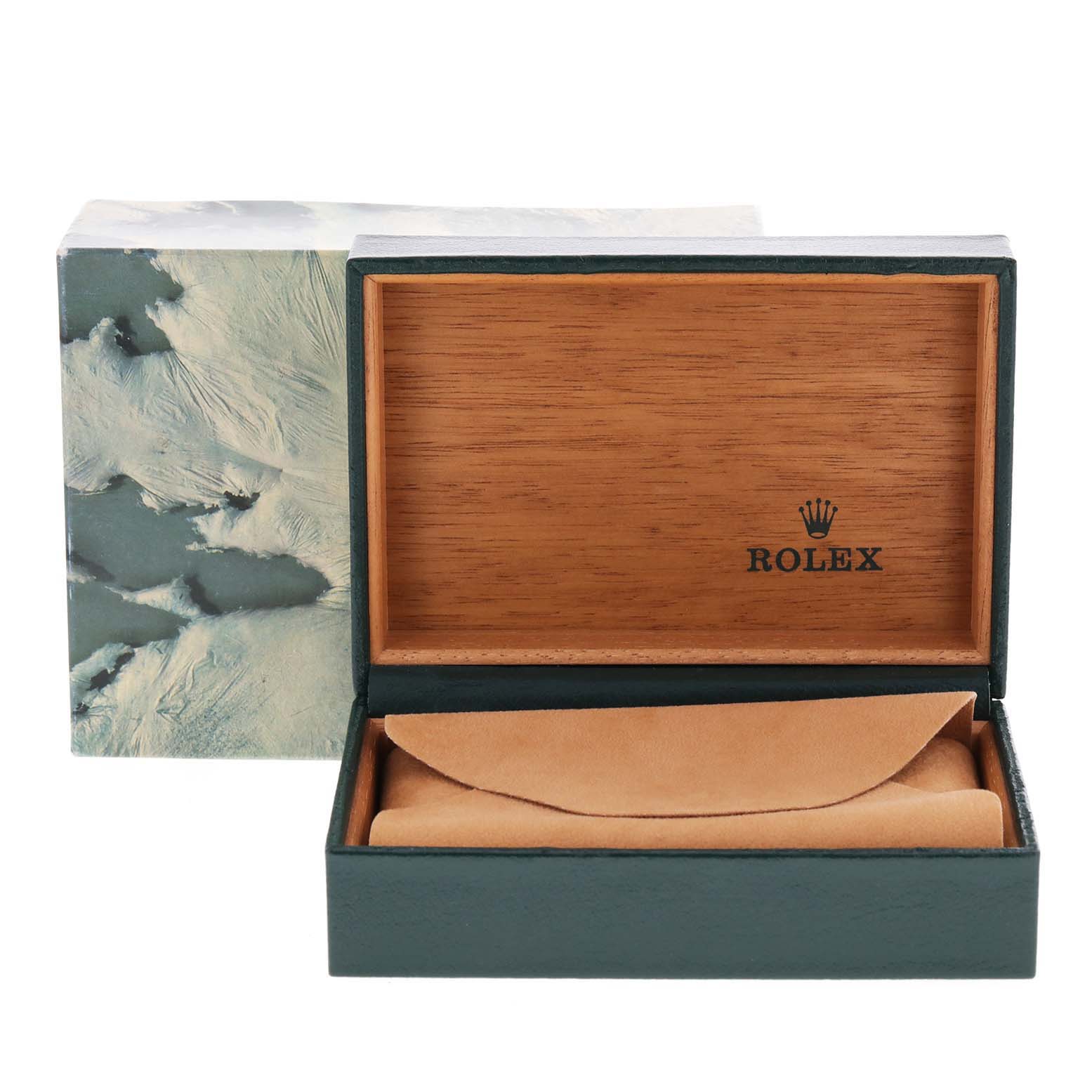 This image shows an open Rolex Vintage Collection 16013 Men's Steel and Gold (two tone) White Dial 16013 Men's Steel and Gold (two tone) White Dial watch box made of wood and leather.