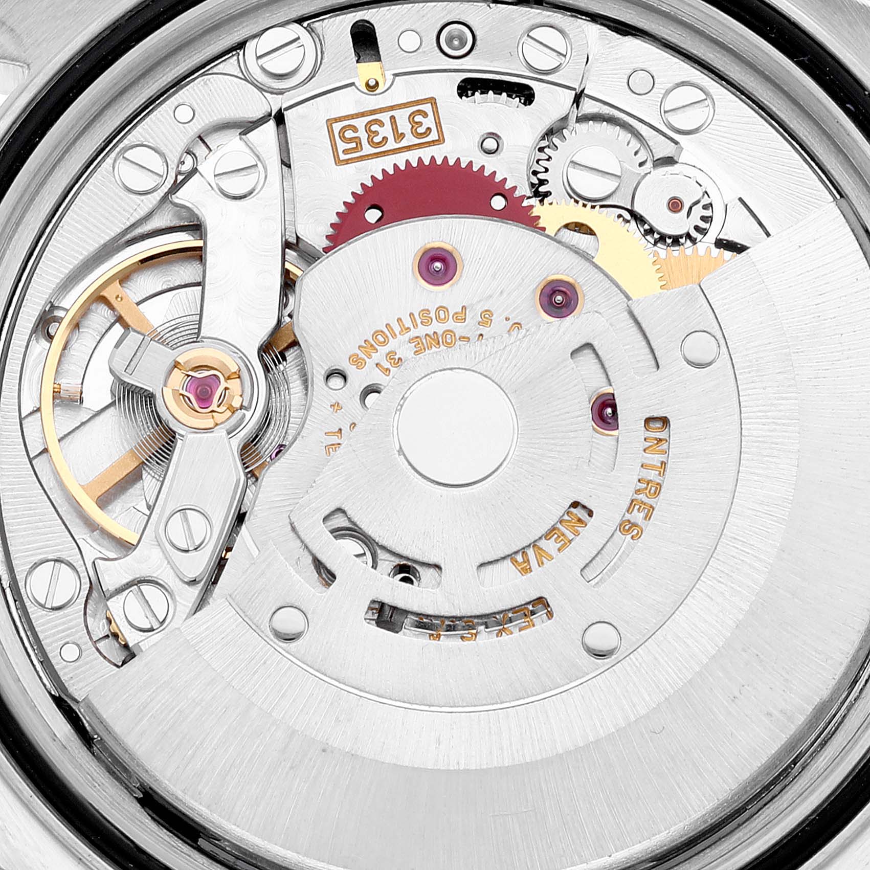 This image shows a close-up of the movement mechanism inside a Rolex Datejust 16233 Men's Steel and Gold (two tone) Champagne Dial 16233 Men's Steel and Gold (two tone) Champagne Dial watch, highlighting gears and components.