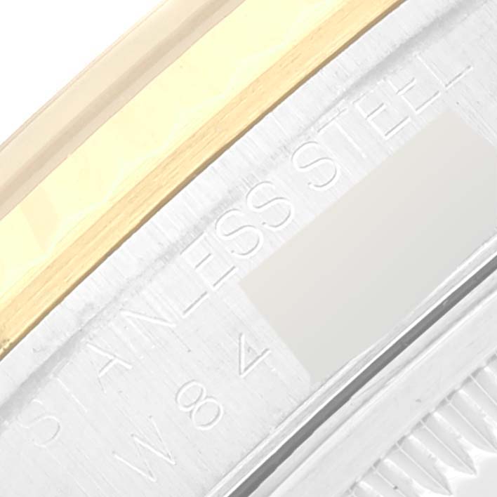 The image shows a close-up of the side engraving on a Rolex Datejust 16233 Men's Steel and Gold (two tone) Champagne Dial 16233 Men's Steel and Gold (two tone) Champagne Dial watch, highlighting the stainless steel marking.