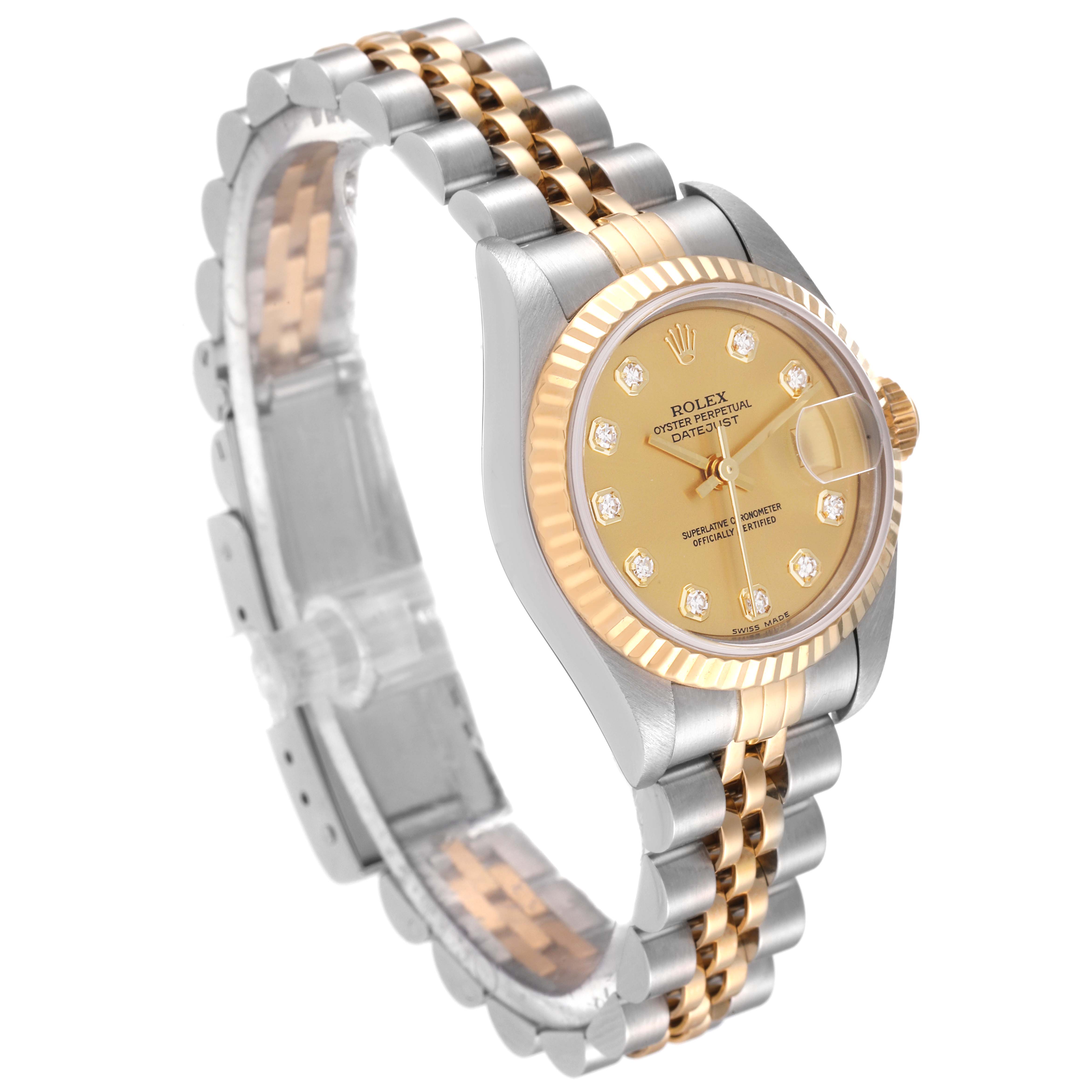The Rolex Datejust 79173 Women's Steel and Gold (two tone) Champagne Dial 79173 Women's Steel and Gold (two tone) Champagne Dial watch is shown at an angled view highlighting its two-tone band, fluted bezel, and dial with diamond hour markers.