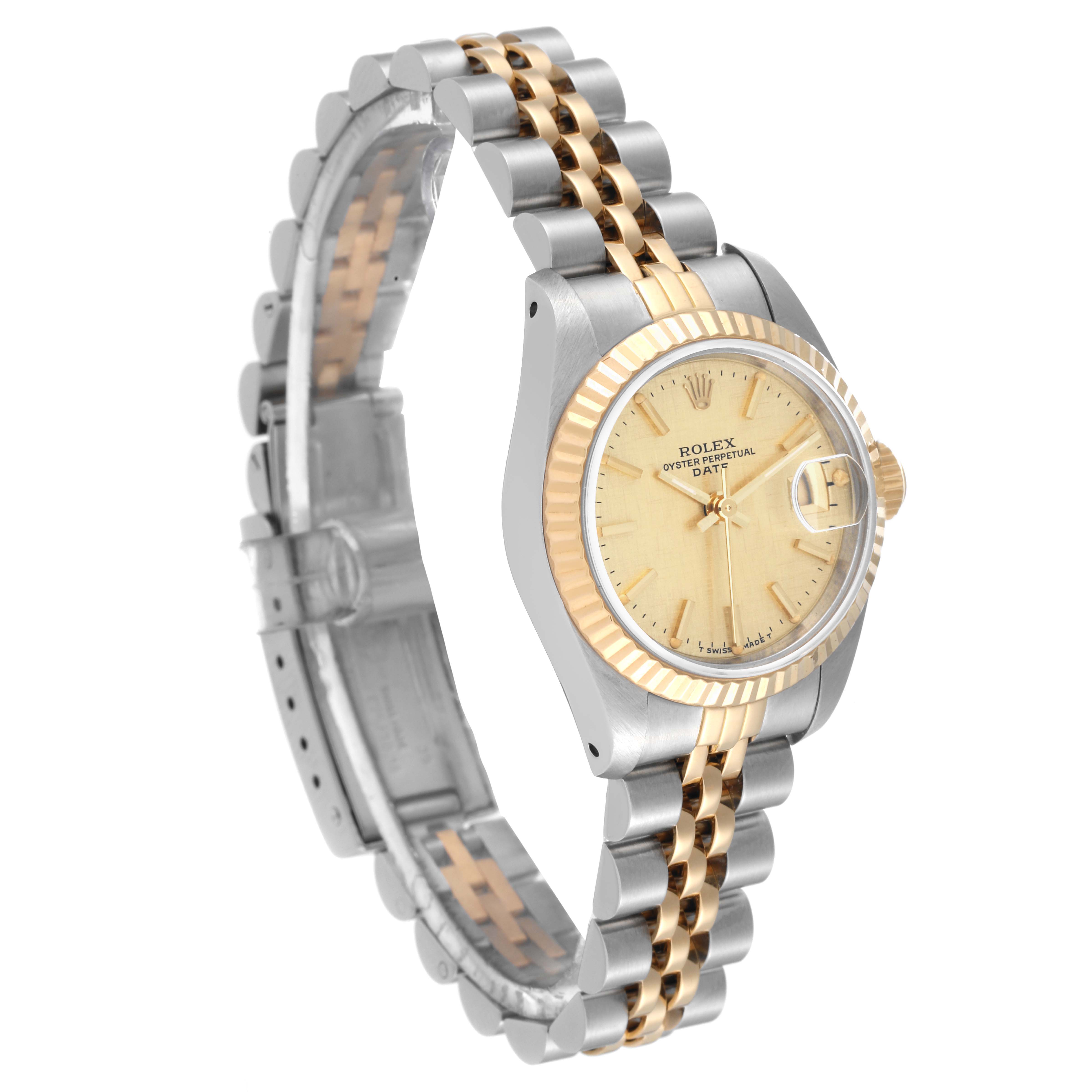 This image shows a Rolex Datejust 69173 Women's Steel and Gold (two tone) Champagne Dial 69173 Women's Steel and Gold (two tone) Champagne Dial watch at an oblique angle, highlighting its face, bezel, and part of the bracelet.