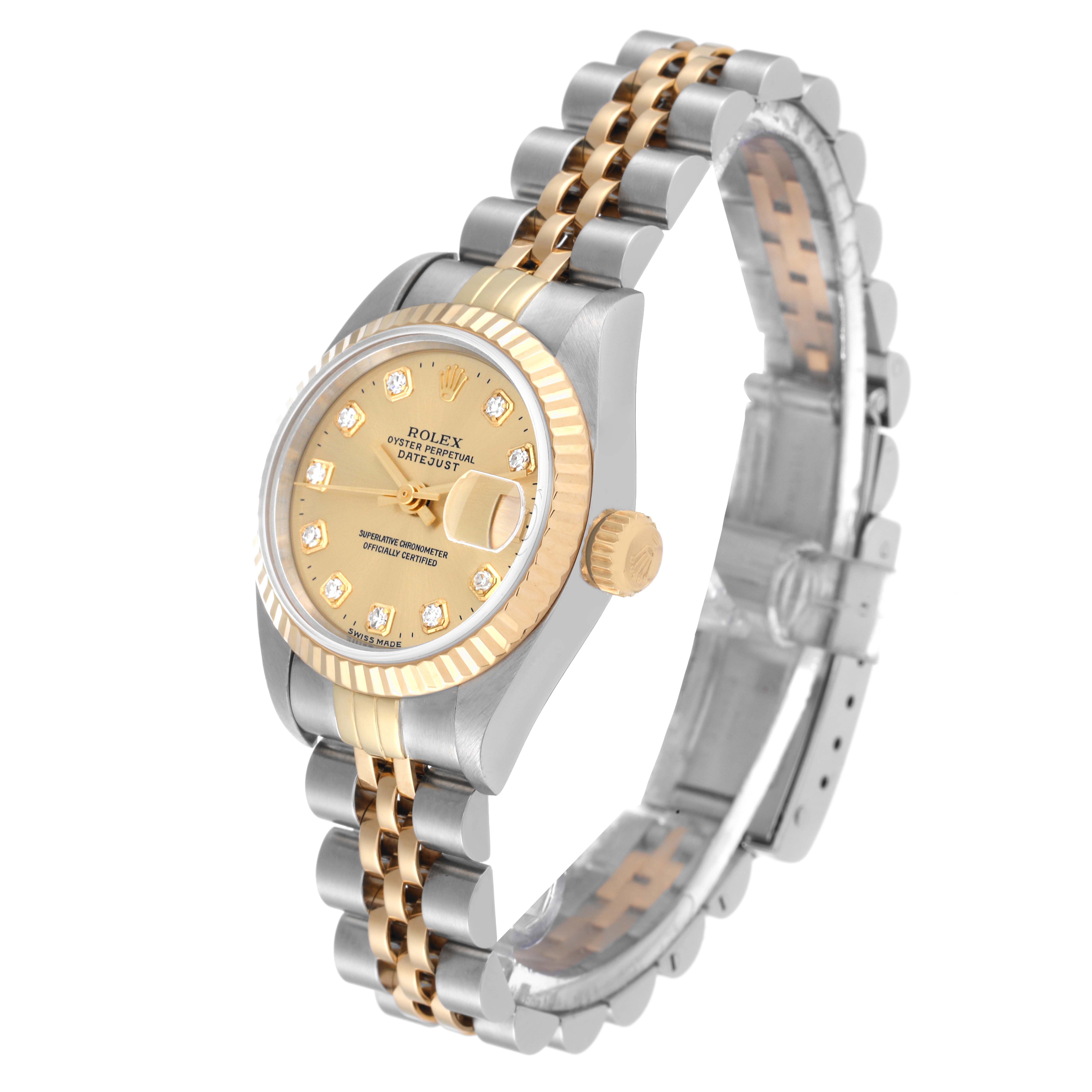 The Rolex Datejust 69173 Women's Steel and Gold (two tone) Champagne Dial 69173 Women's Steel and Gold (two tone) Champagne Dial watch is shown at a three-quarter angle, displaying its gold dial, fluted bezel, and two-tone bracelet.