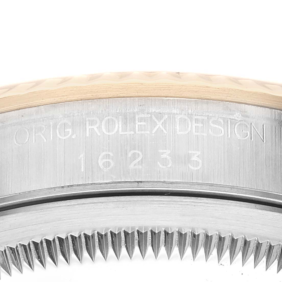 This image shows a close-up of the model number and design engraving on a Rolex Datejust 16233 Men's Steel and Gold (two tone) Champagne Dial 16233 Men's Steel and Gold (two tone) Champagne Dial watch bezel.