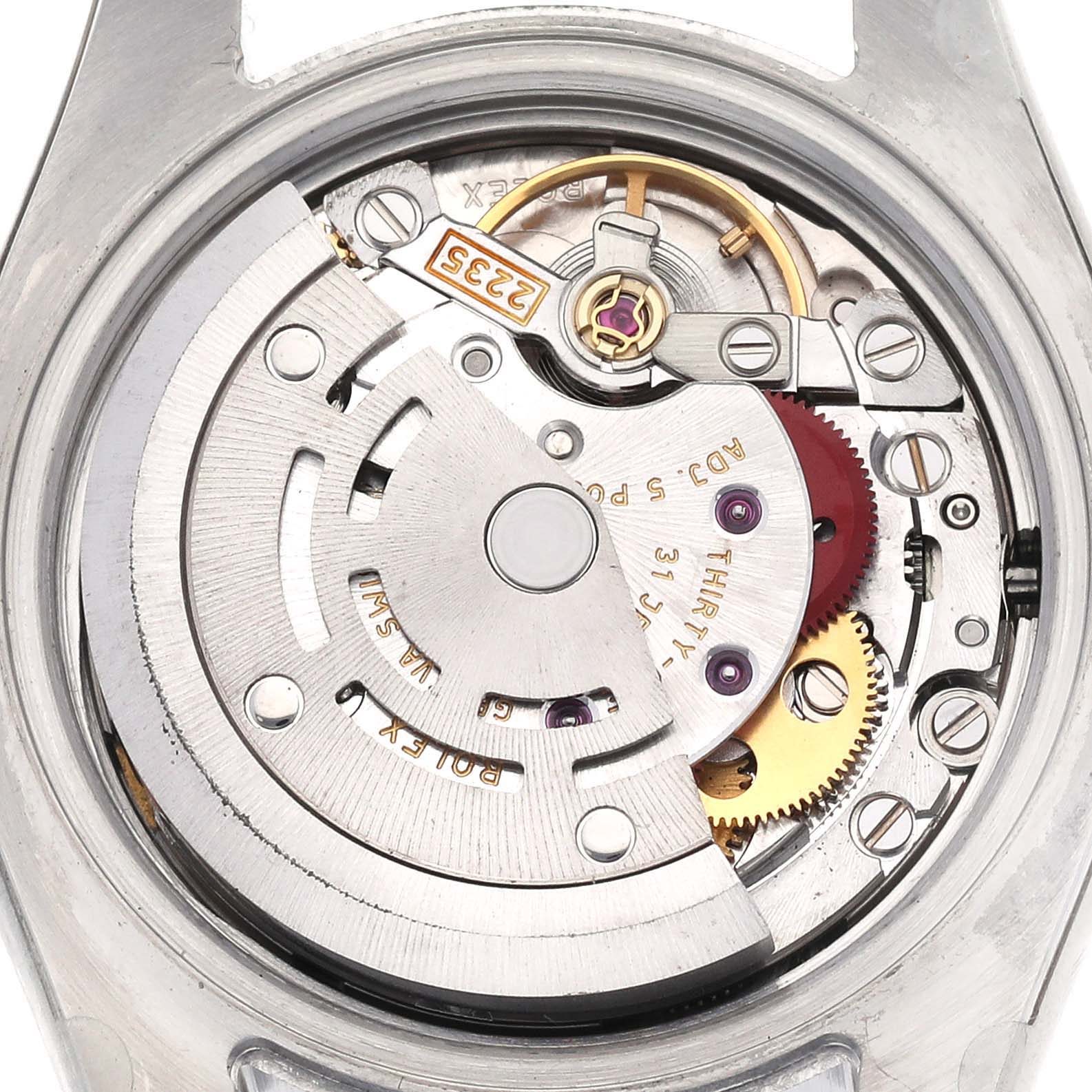 The image shows the movement mechanism of a Rolex Datejust 179163 Women's Steel and Gold (two tone) White Dial 179163 Women's Steel and Gold (two tone) White Dial watch from a rear angle, highlighting gears and rotor.