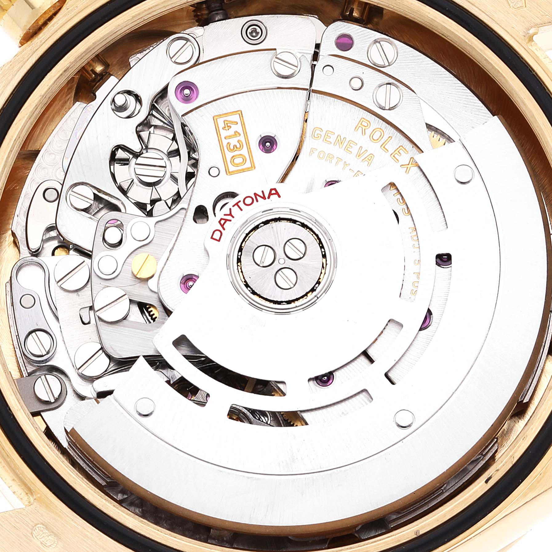 This image shows the intricate internal movement mechanism of a Rolex Daytona 116528 Men's Yellow Gold Mother of Pearl Dial 116528 Men's Yellow Gold Mother of Pearl Dial watch.